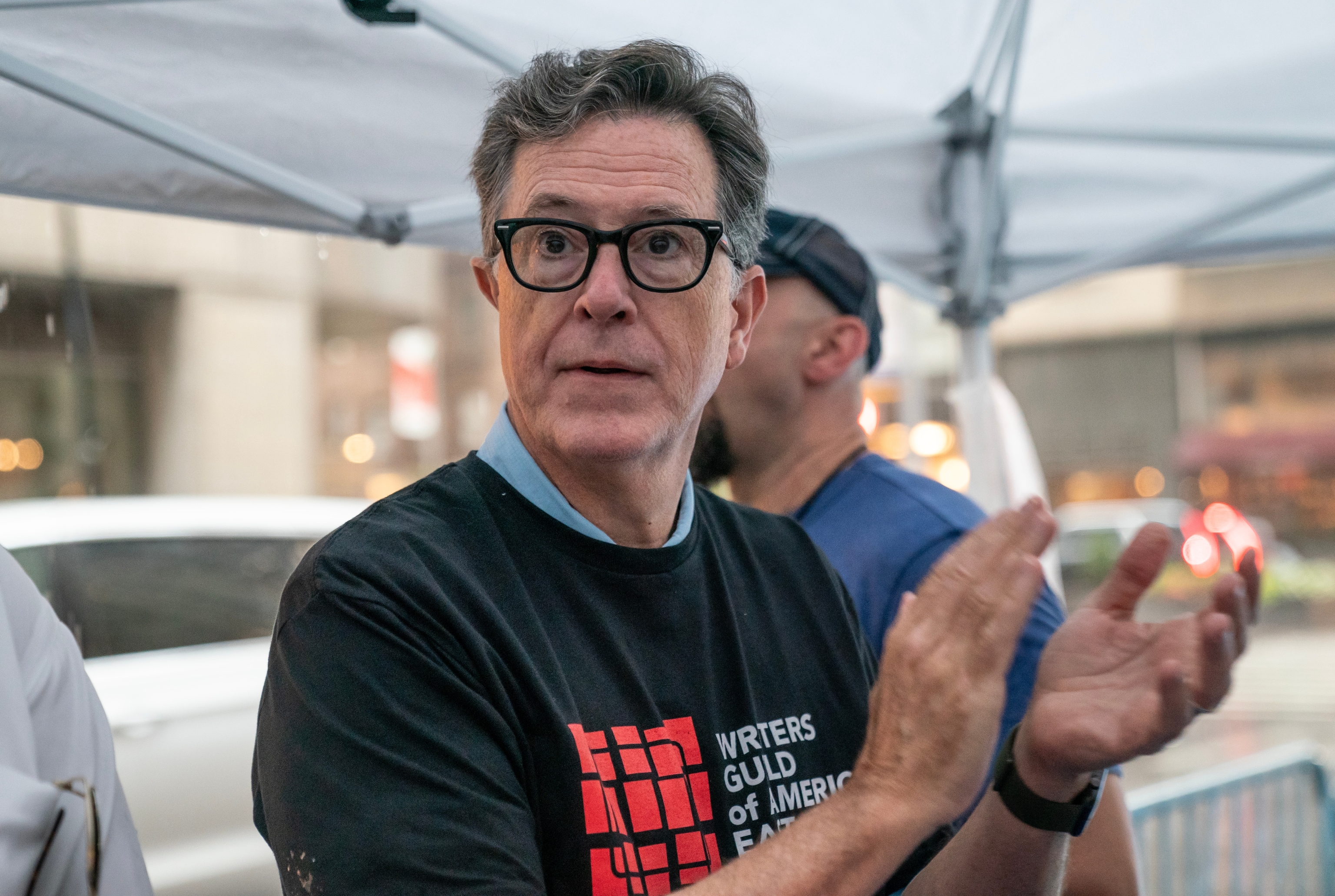 Stephen Colbert serves ice cream during the SAG-AFTRA strike in July.