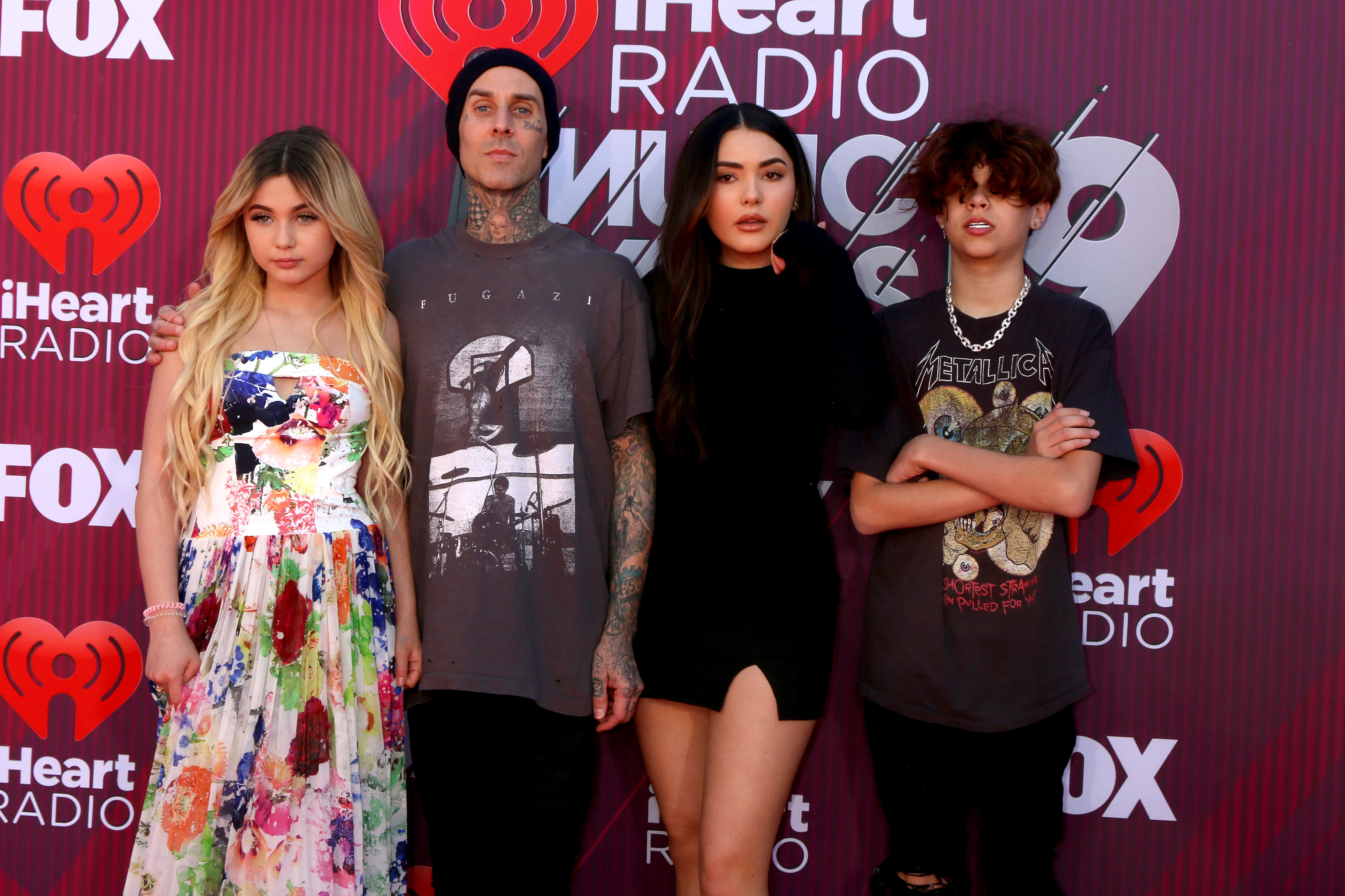 Alabama Brker, Travis Barker, Atiana De La Hoya, Landon Barke at the iHeart Radio Music Awards - Arrivals at the Microsoft Theater on March 14, 2019 in Los Angeles, CA.