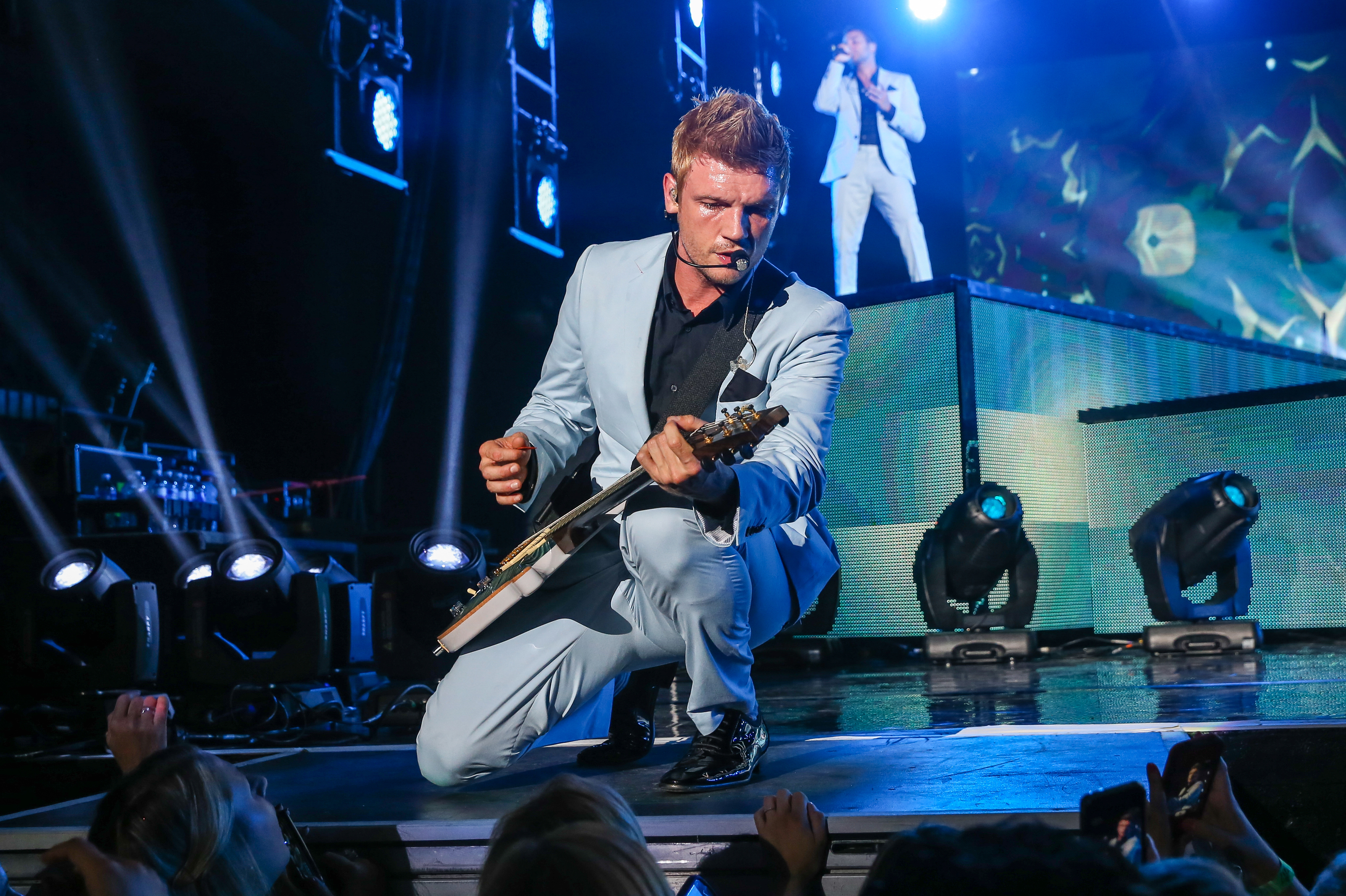 Nick Carter, pictured in concert with The Backstreet Boys in 2013.