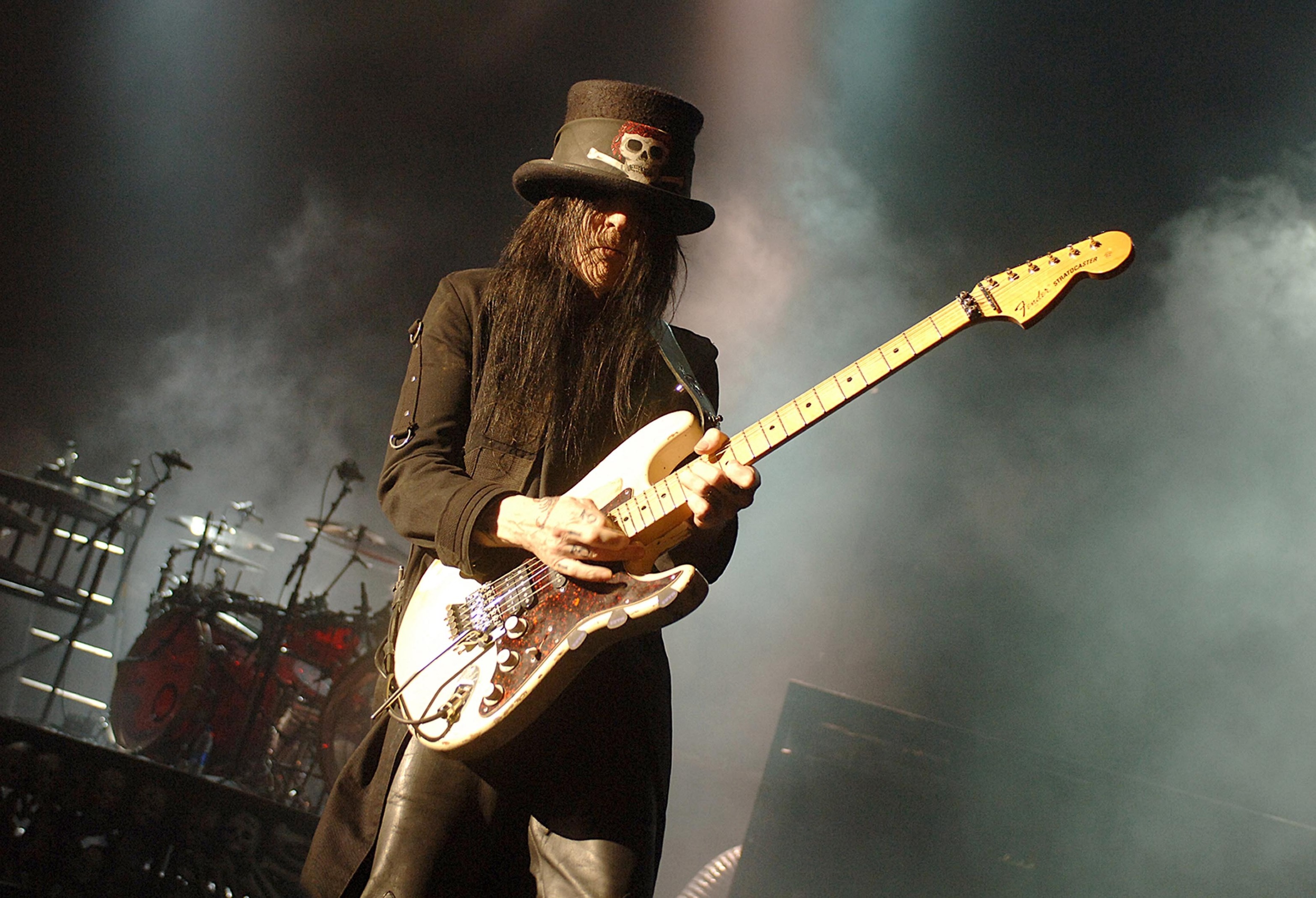 Mick Mars performs with Motley Crue in London in June 2007.