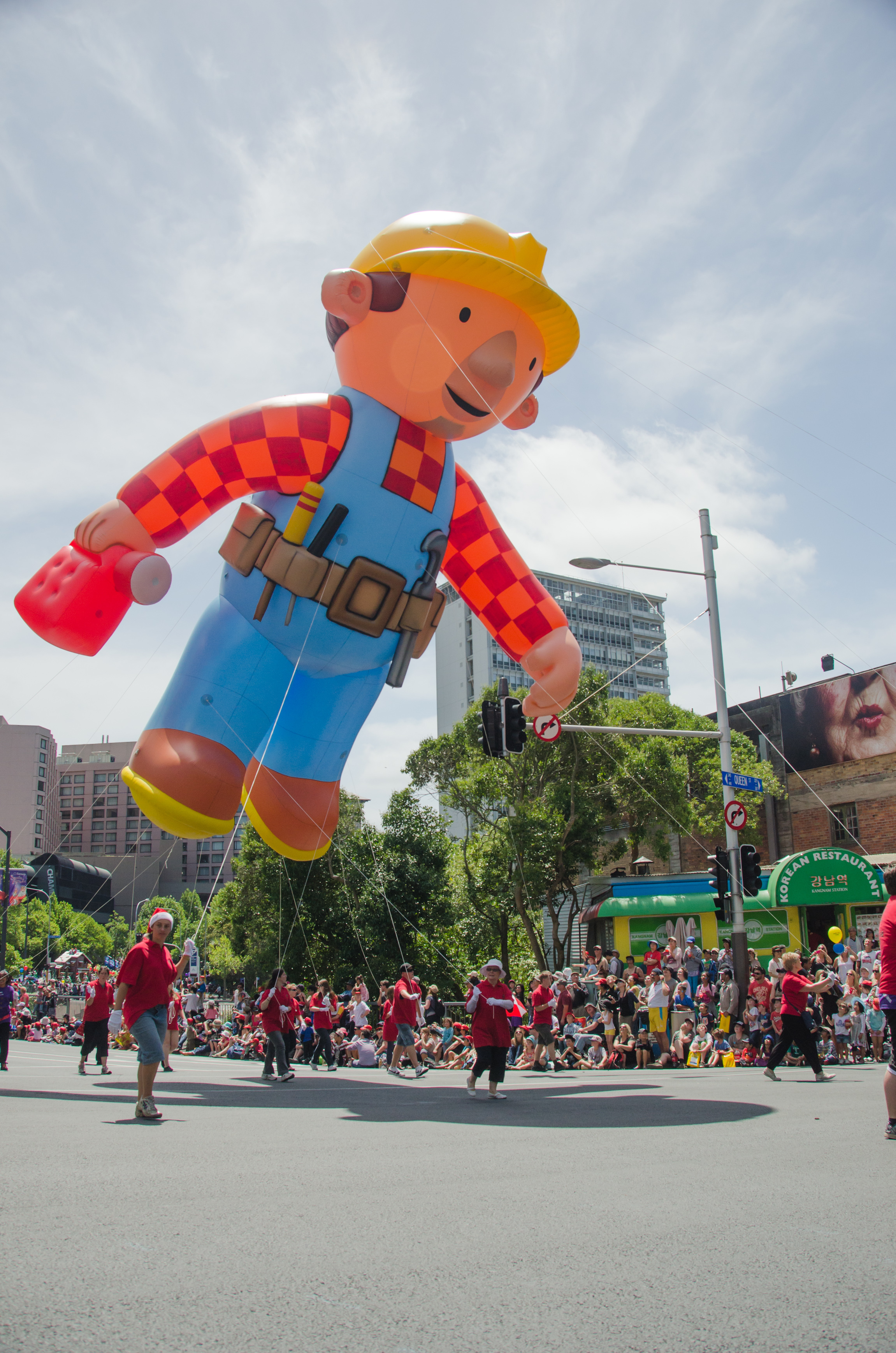 Participants carry a Bob the Builder balloon at the annual Christmas Parade on November 27, 2011 in Auckland, New Zealand.