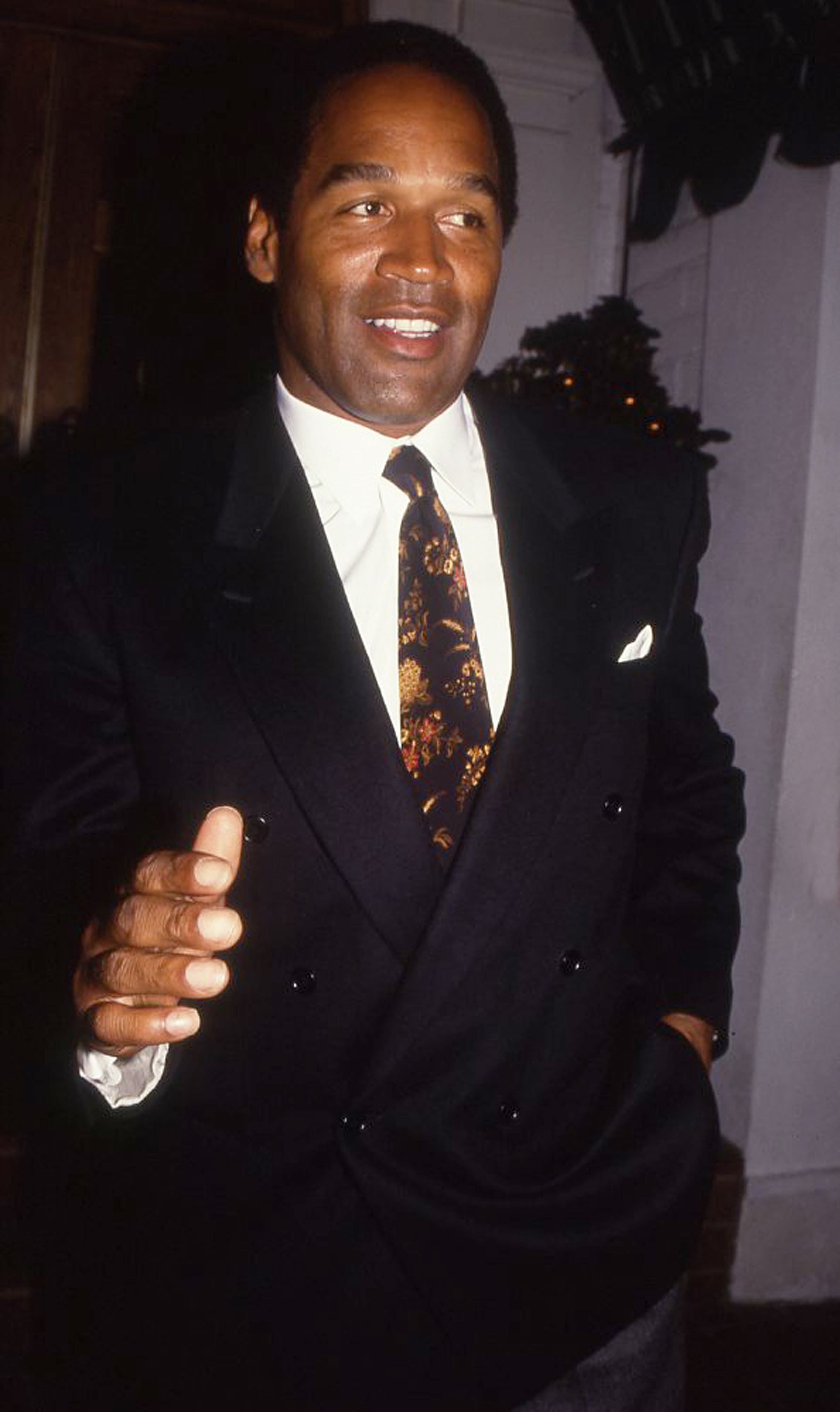 O.J. Simpson arriving at a celebrity event circa 1990.