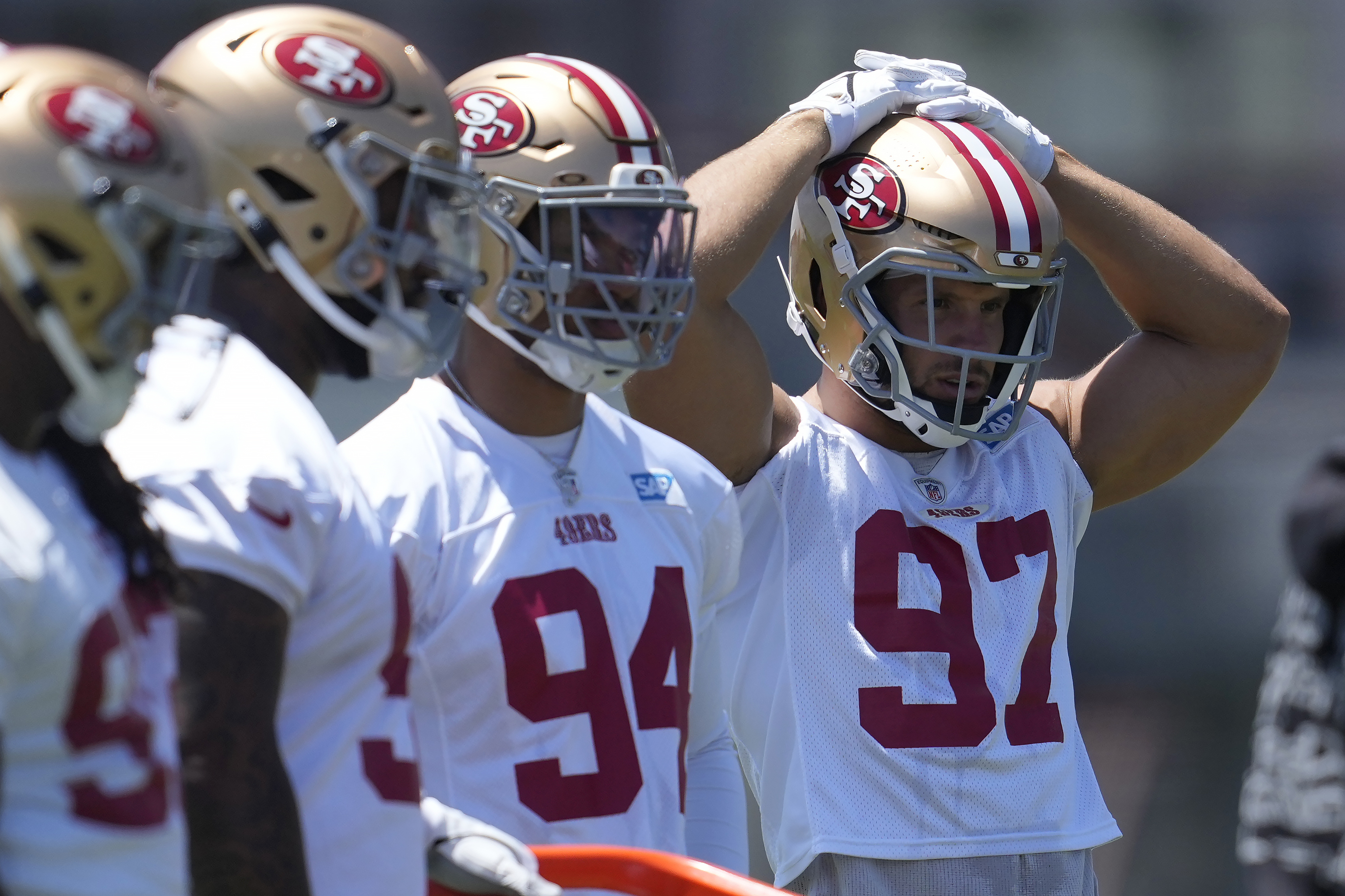 San Francisco 49ers' Yetur Gross-Matos (94), Nick Bosa (97).