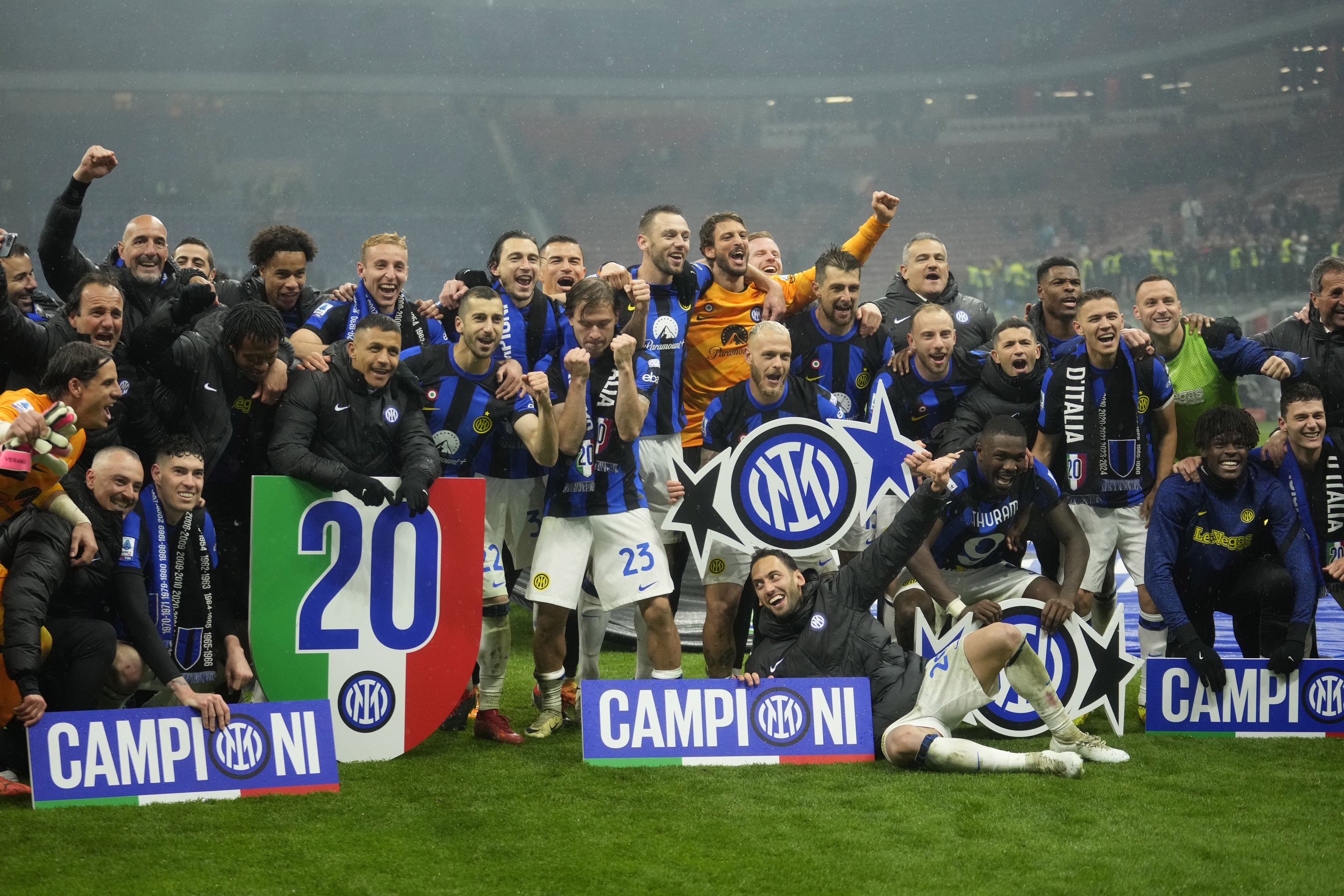 Inter Milan players celebrate its 20th league title at San Siro.