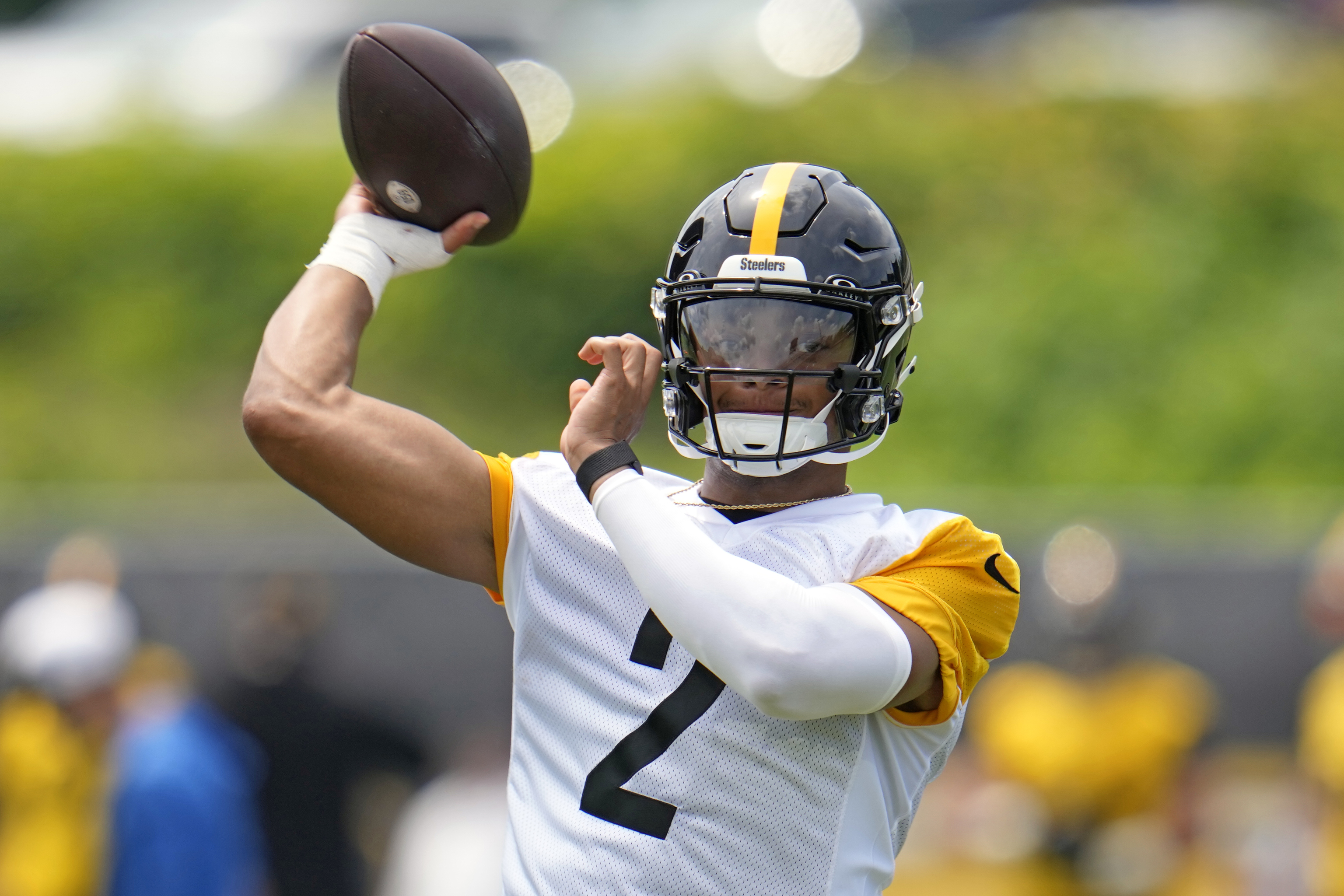 Pittsburgh Steelers quarterback Justin Fields throws a pass.