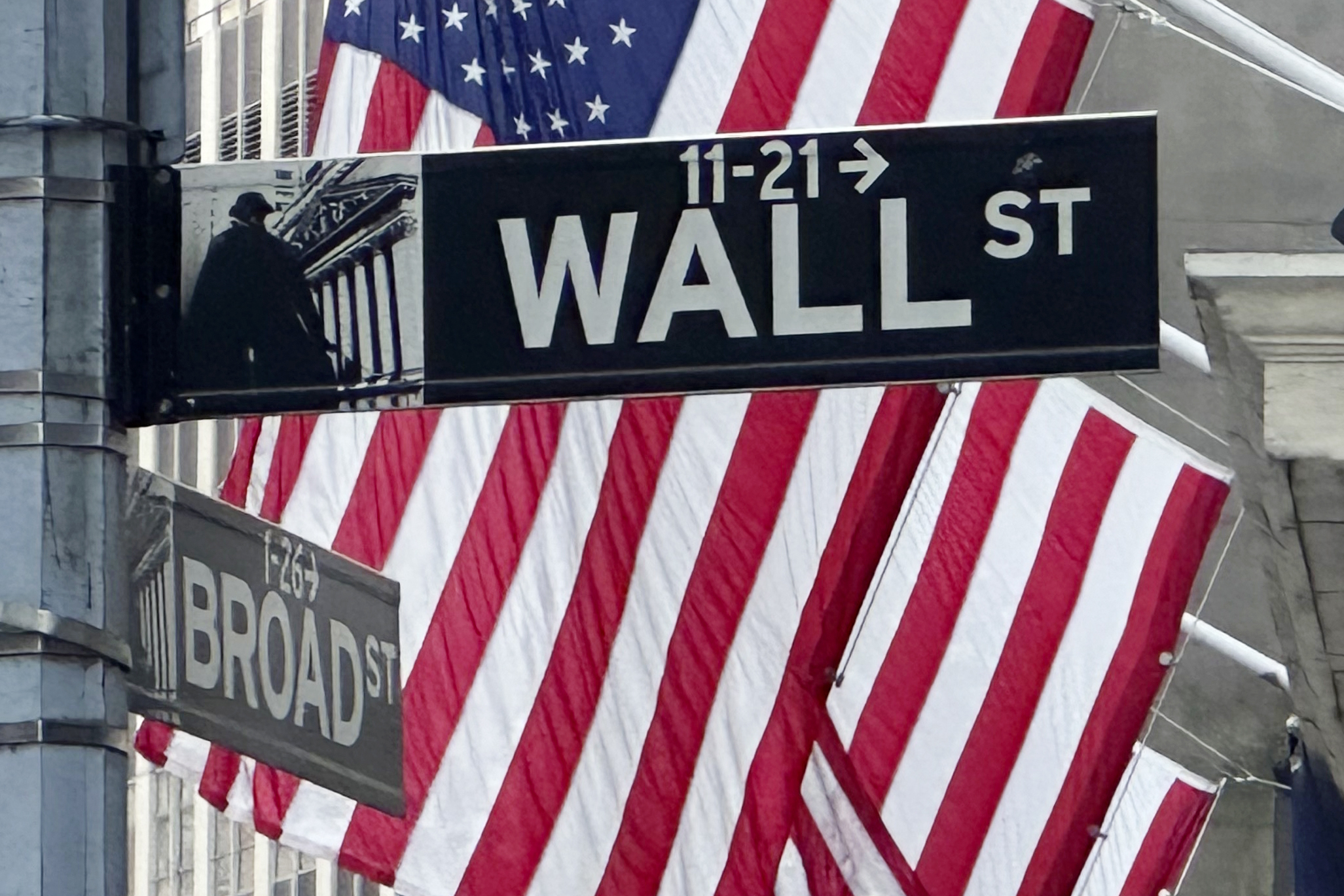 American flags fly on the front of the New York Stock Exchange.