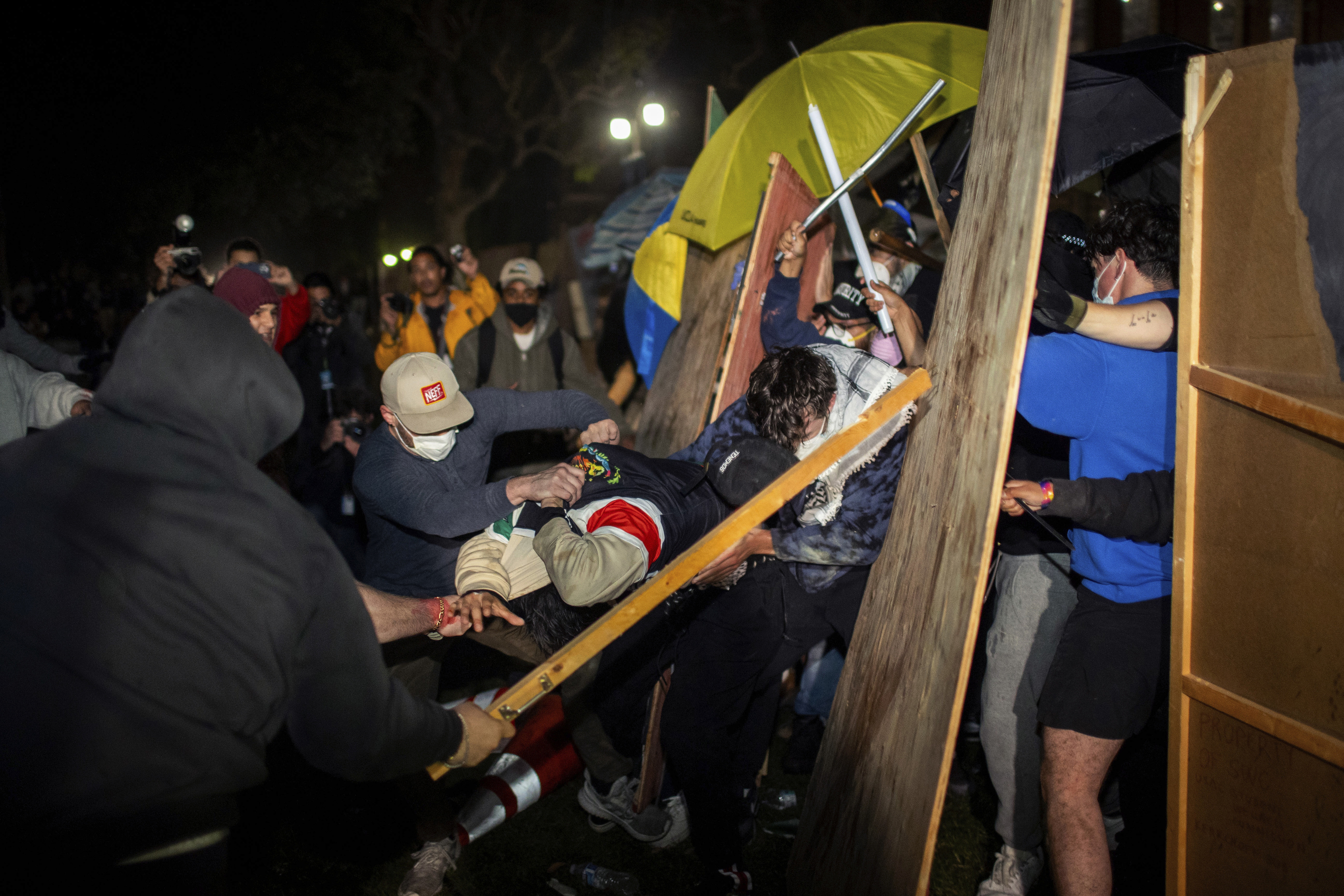 Demonstrators clash at a pro-Palestinian encampment at UCLA.