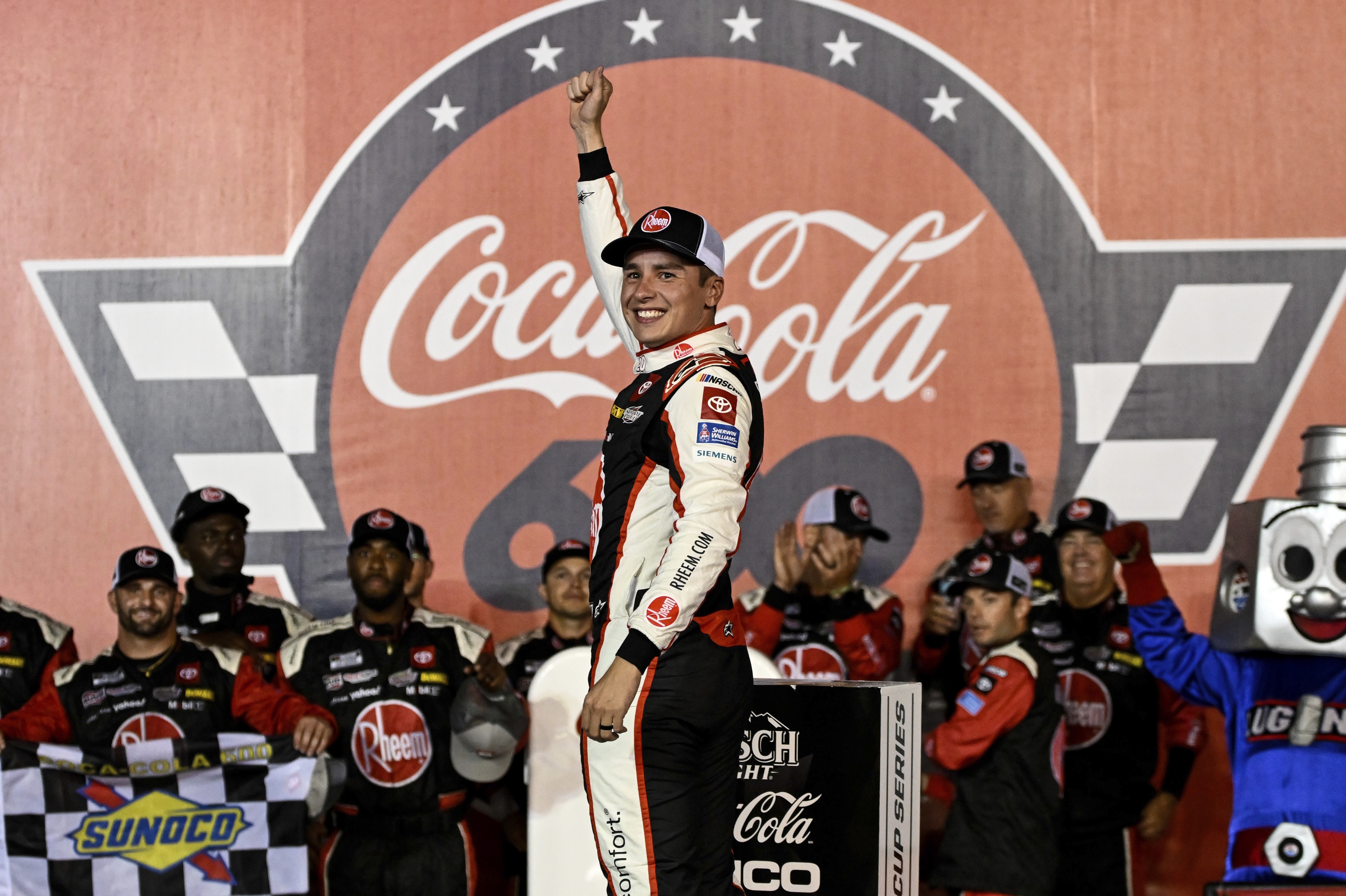 Bell celebrates in Victory Lane after winning a NASCAR Cup.