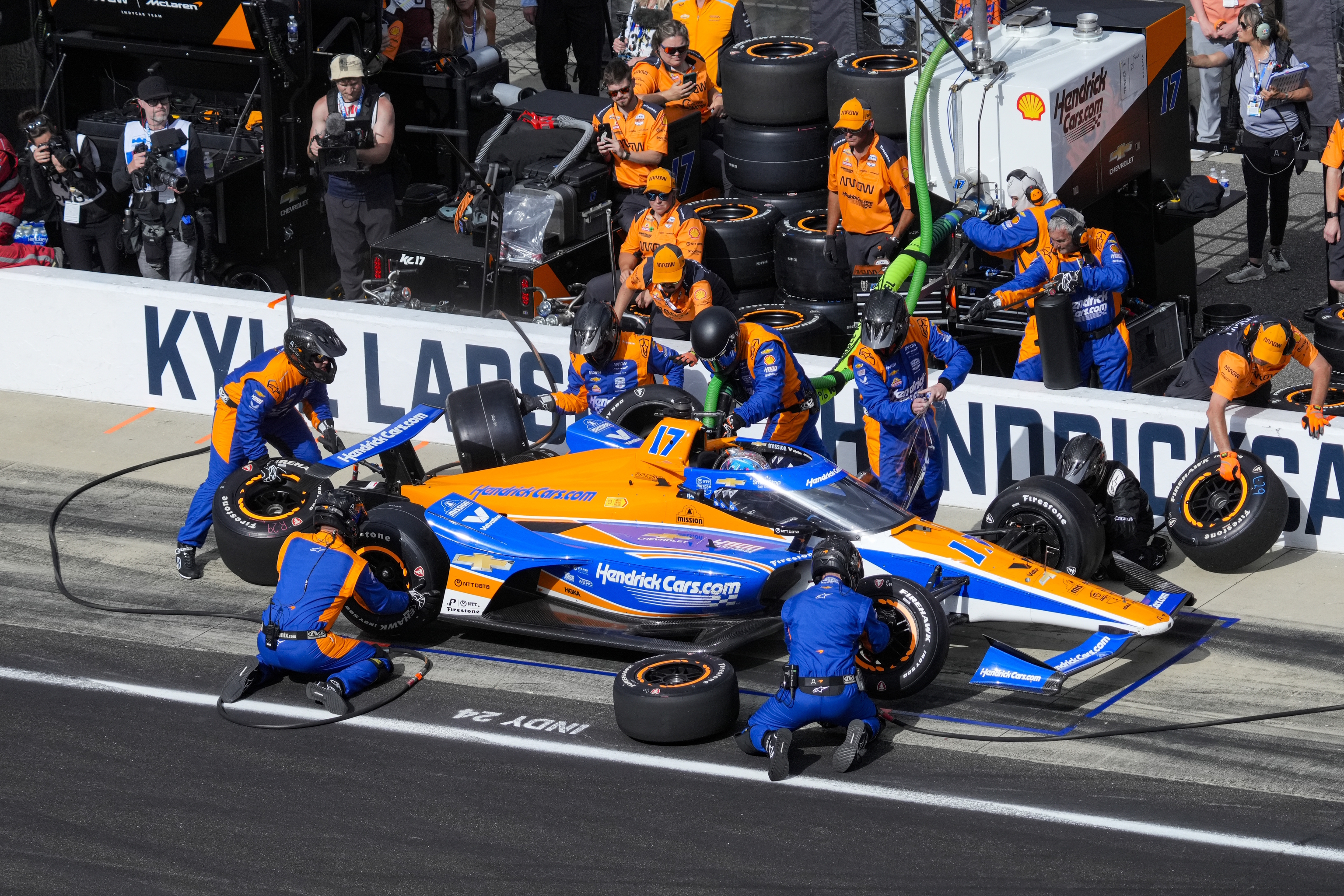 Kyle Larson pits during the Indianapolis 500 auto race.