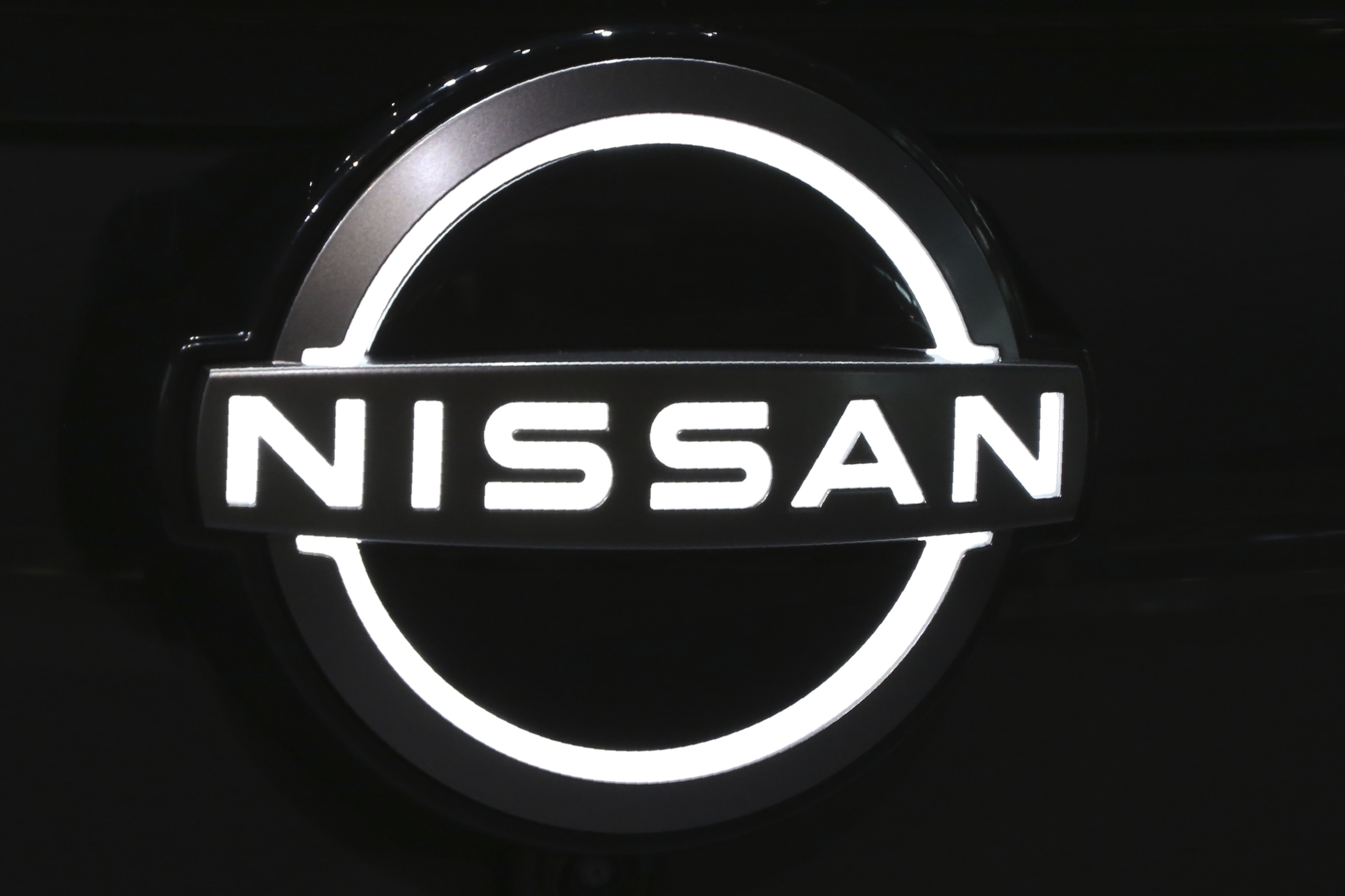 The Nissan logo.