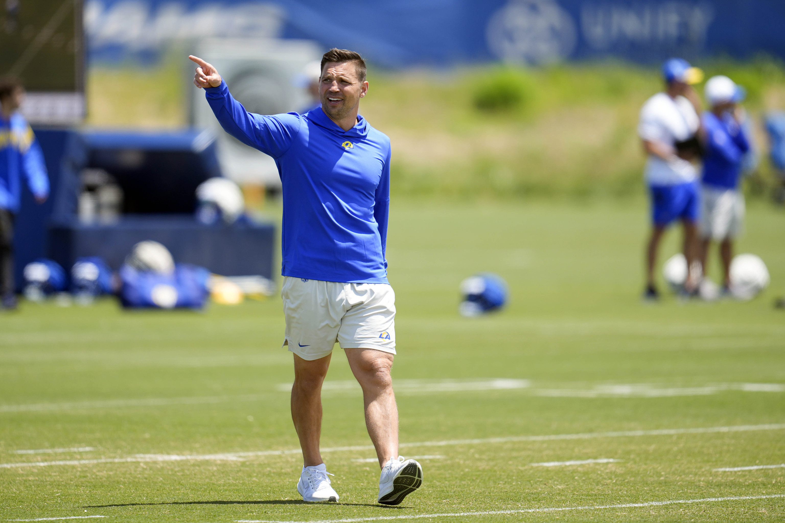 Matt LaFleur walks on the field during the NFL football.