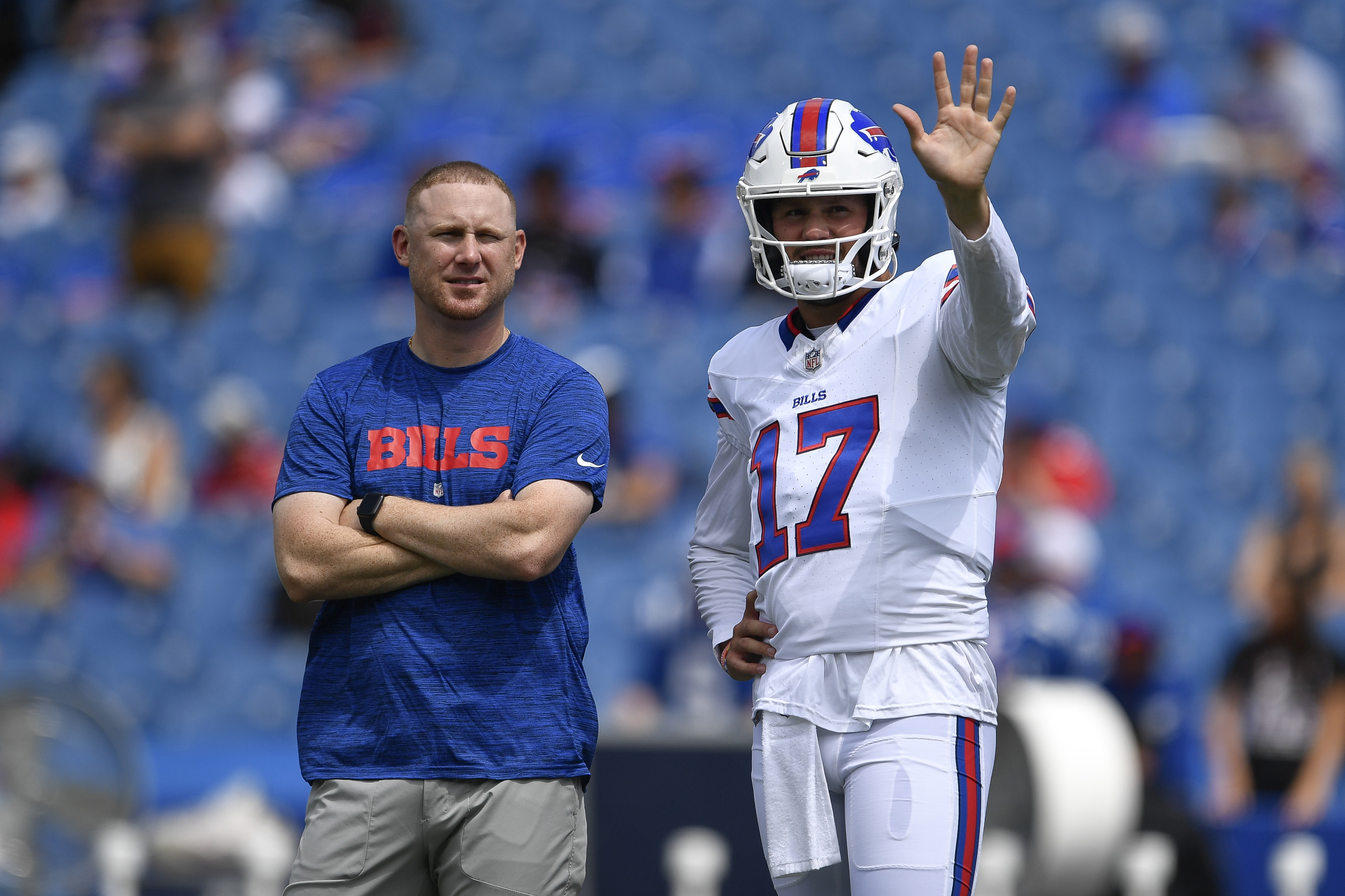 Buffalo Bills quarterback Josh Allen, right, talks with then-quarterbacks coach Joe Brady.