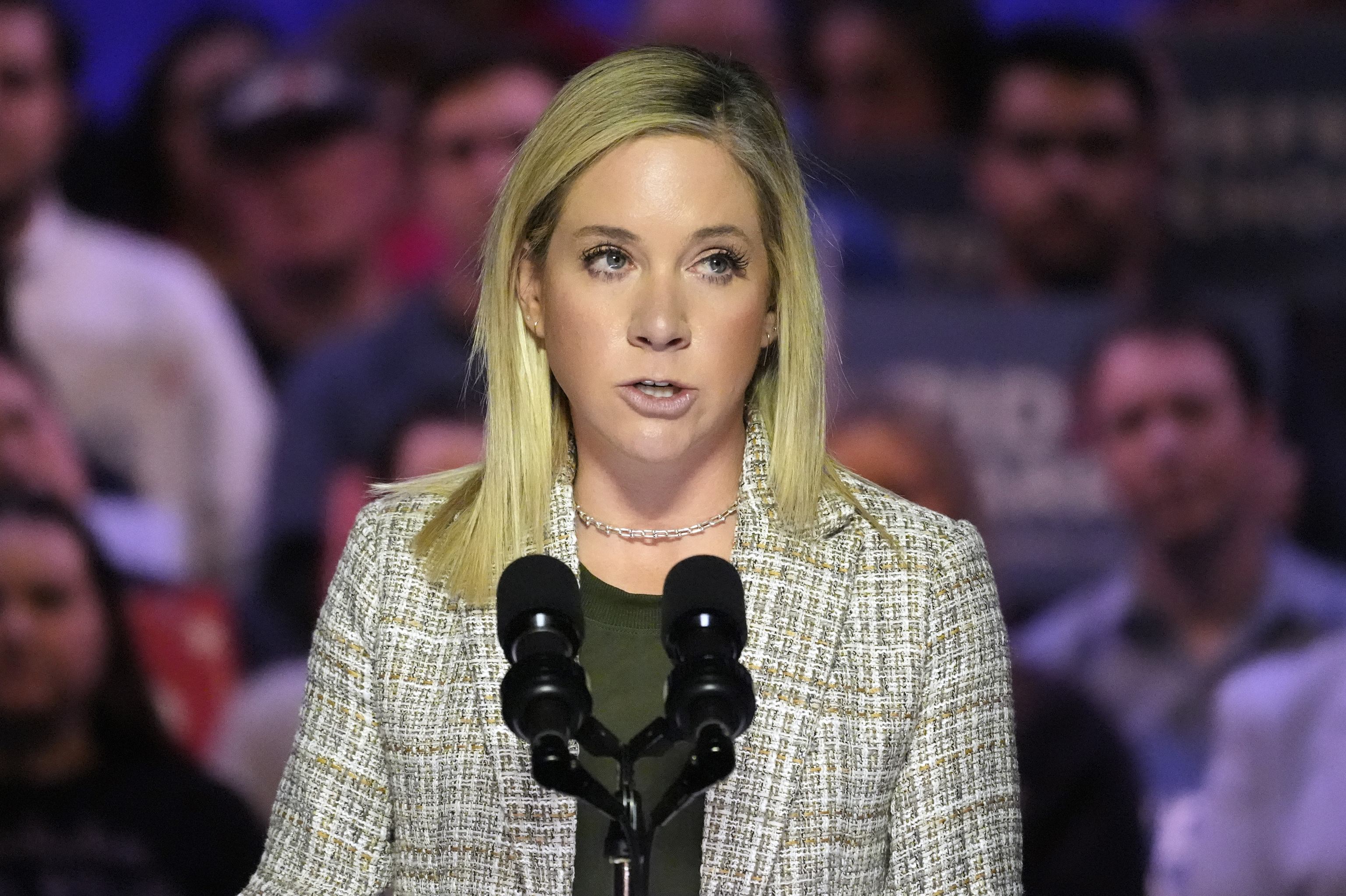 Amanda Zurawski introduces President Joe Biden to speak at an event on the campus of George Mason University.