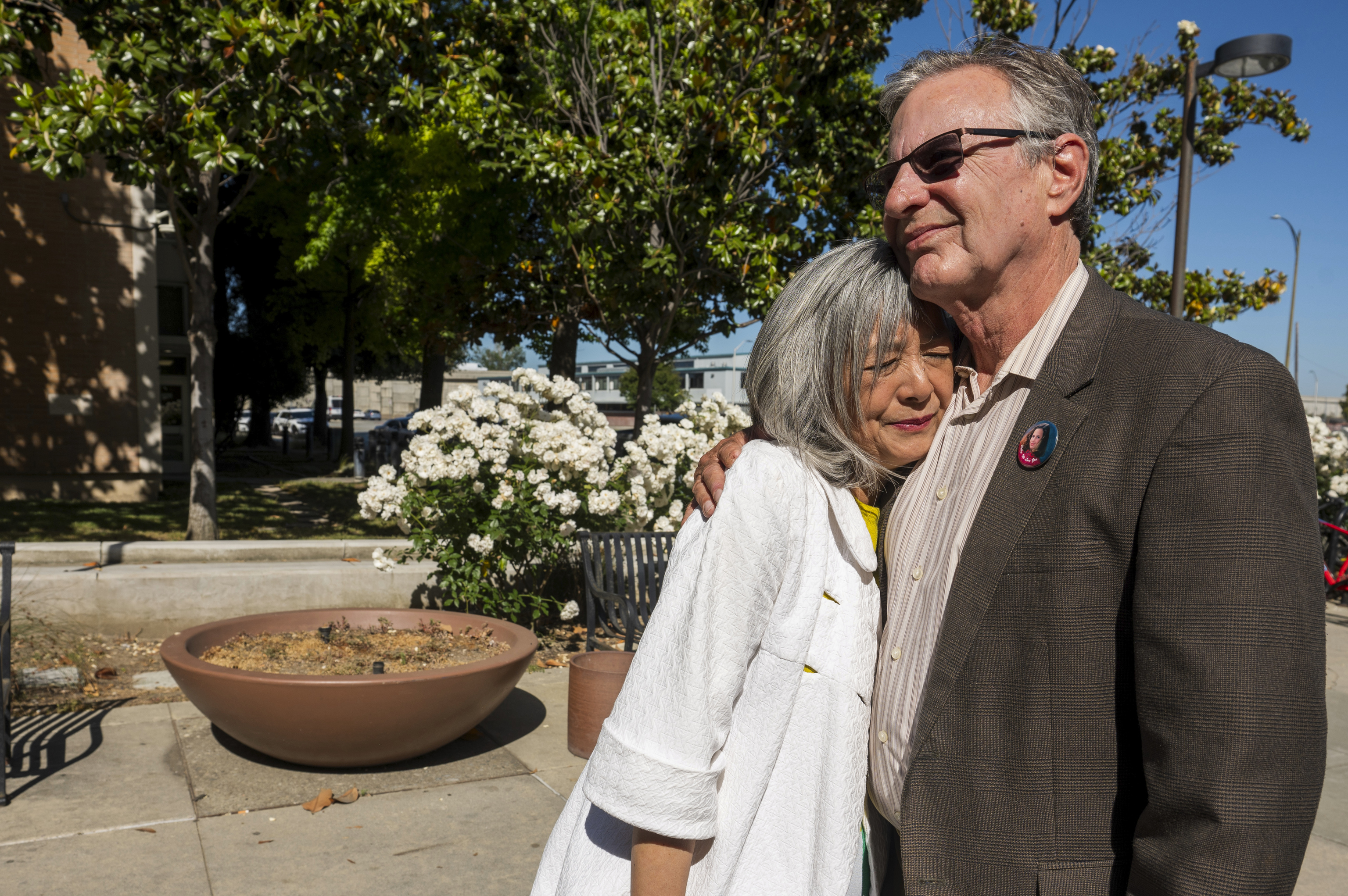 Marc Klaas, father of Polly Klaas, right, hugs his wife Violet outside Santa Clara County Superior Court.