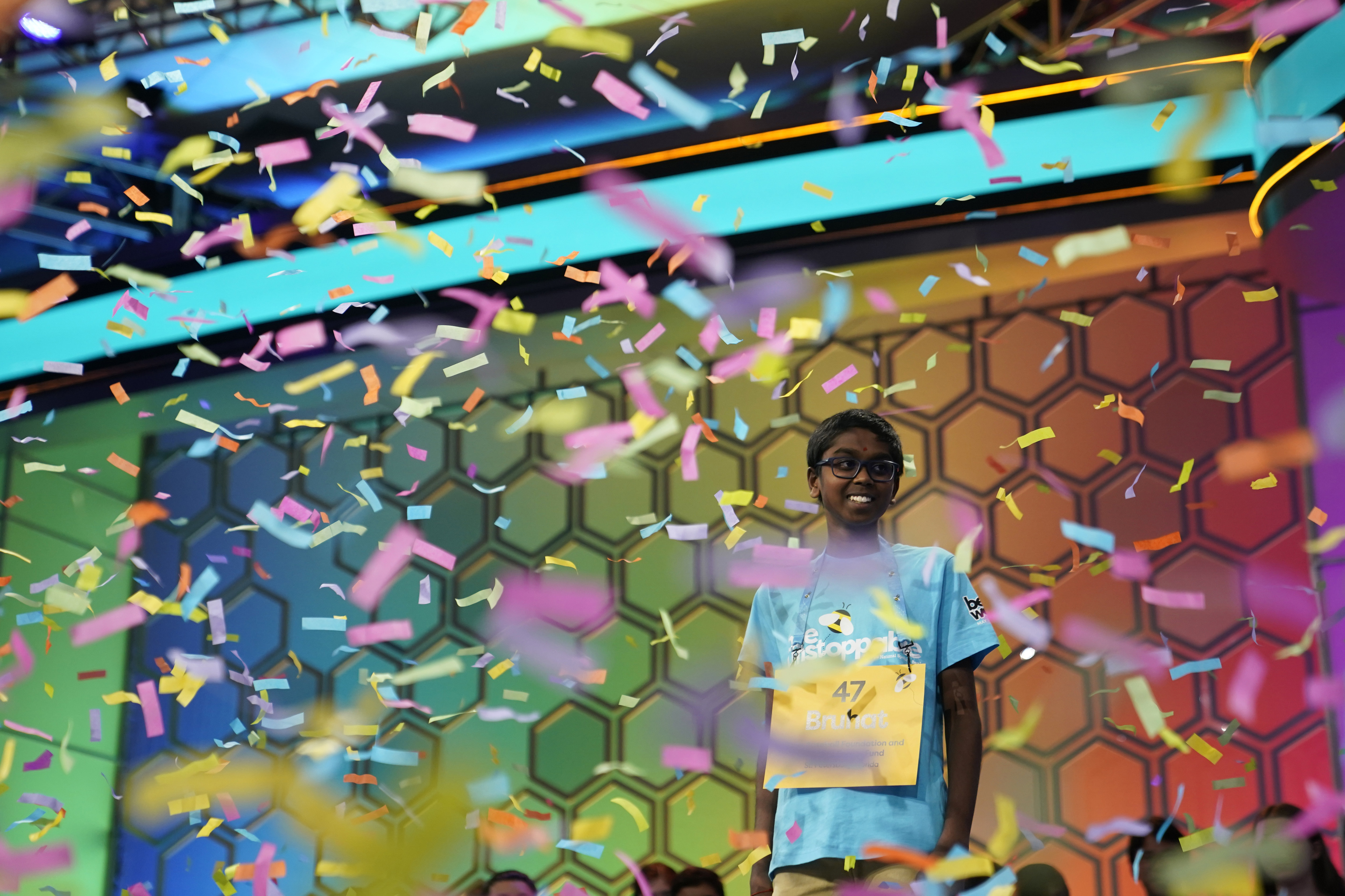 Bruhat Soma, 12, of Tampa, Fla., stands amid confetti after winning the Scripps National Spelling Bee.