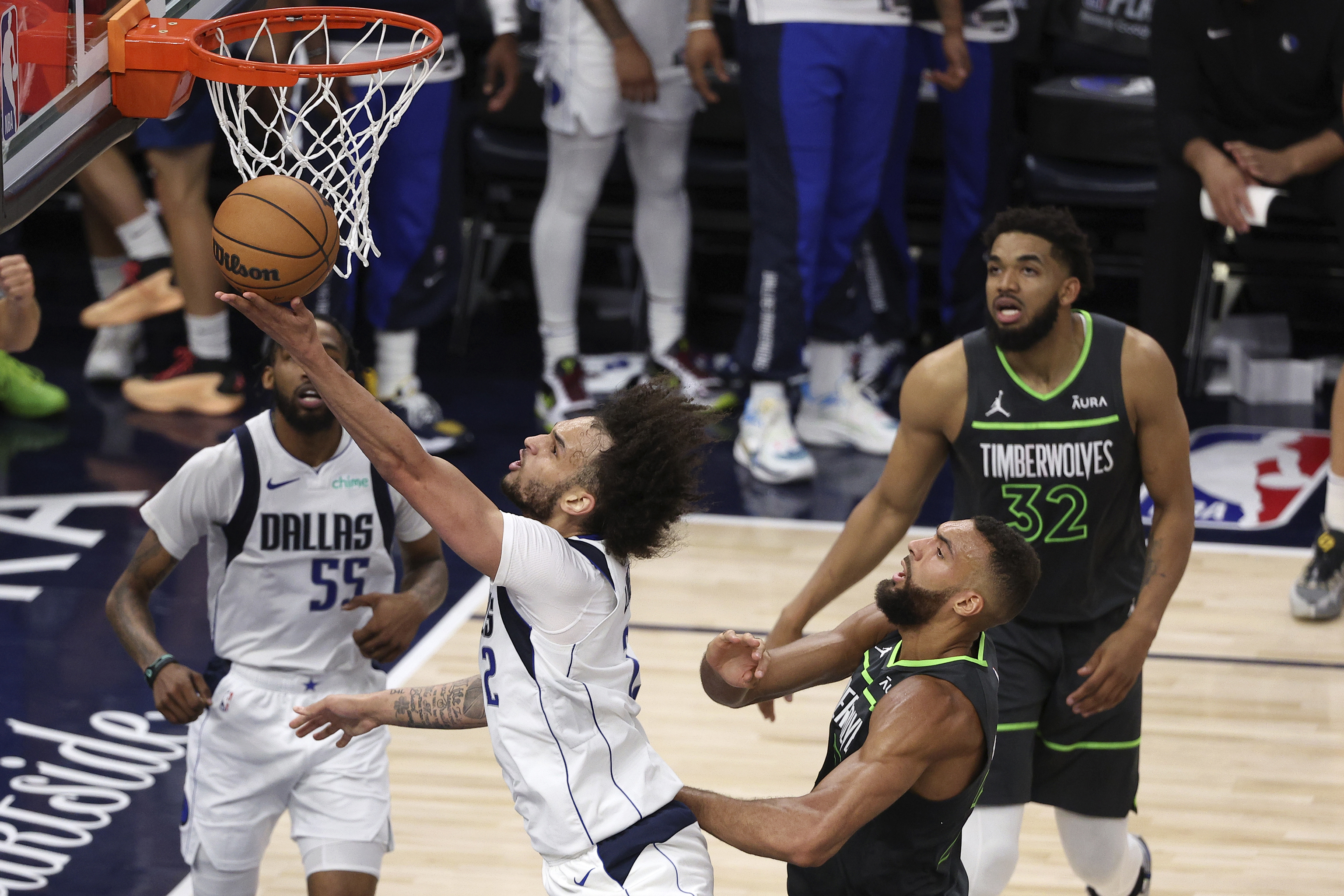 Dallas Mavericks center Dereck Lively II (2) gets fouled.