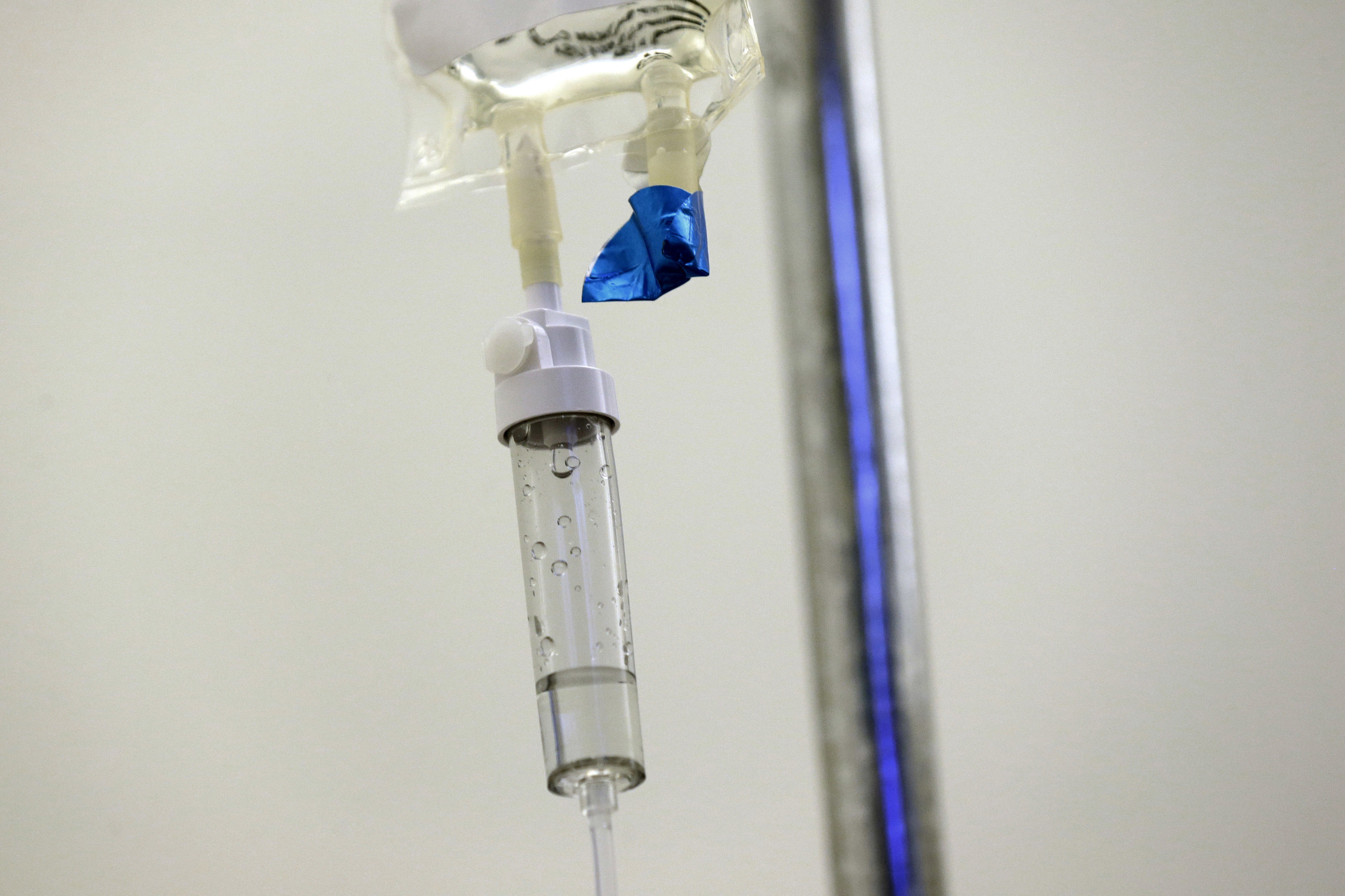 chemotherapy drugs are administered to a patient at a hospital.