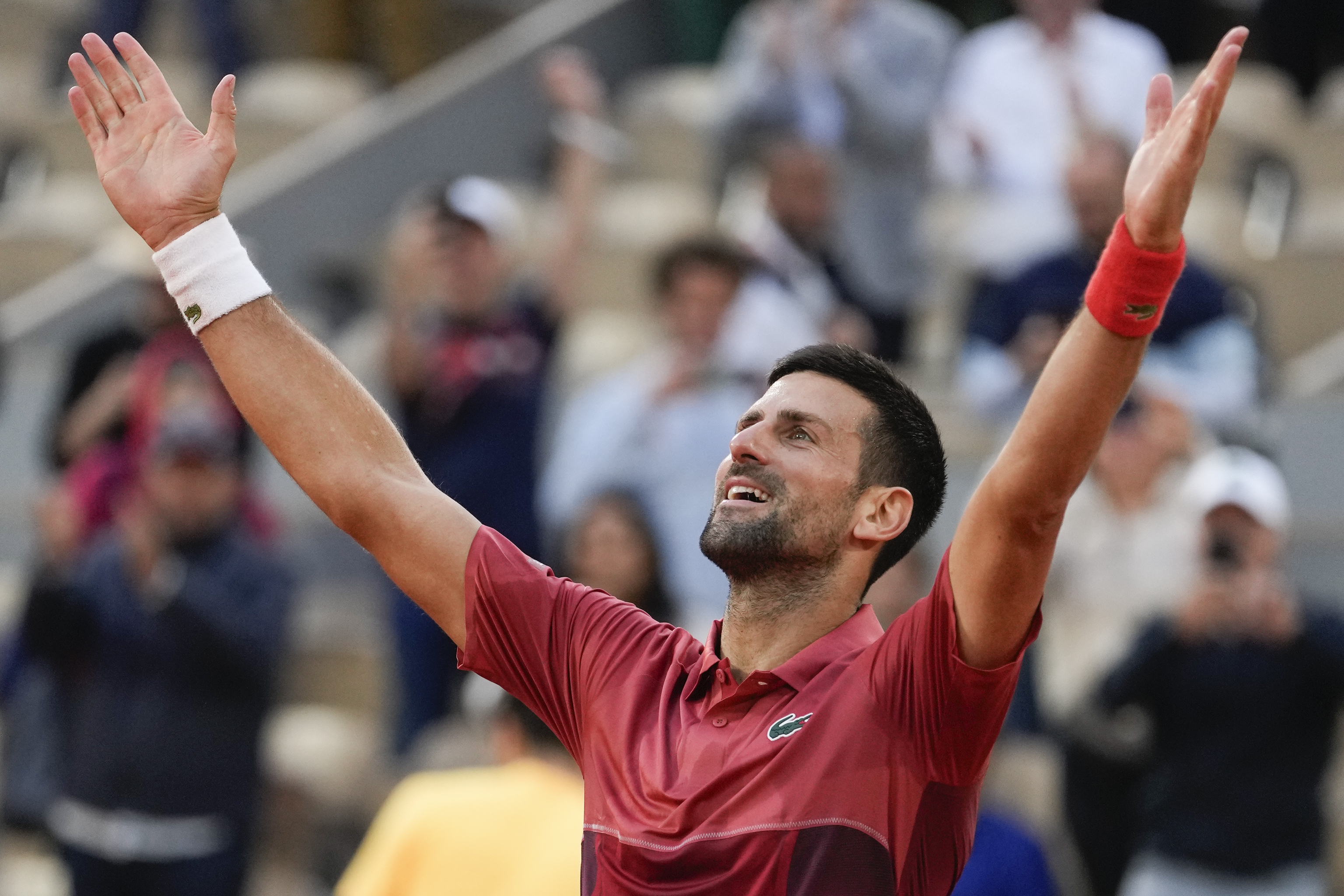 Djokovic celebrates the victory at Roland Garros.