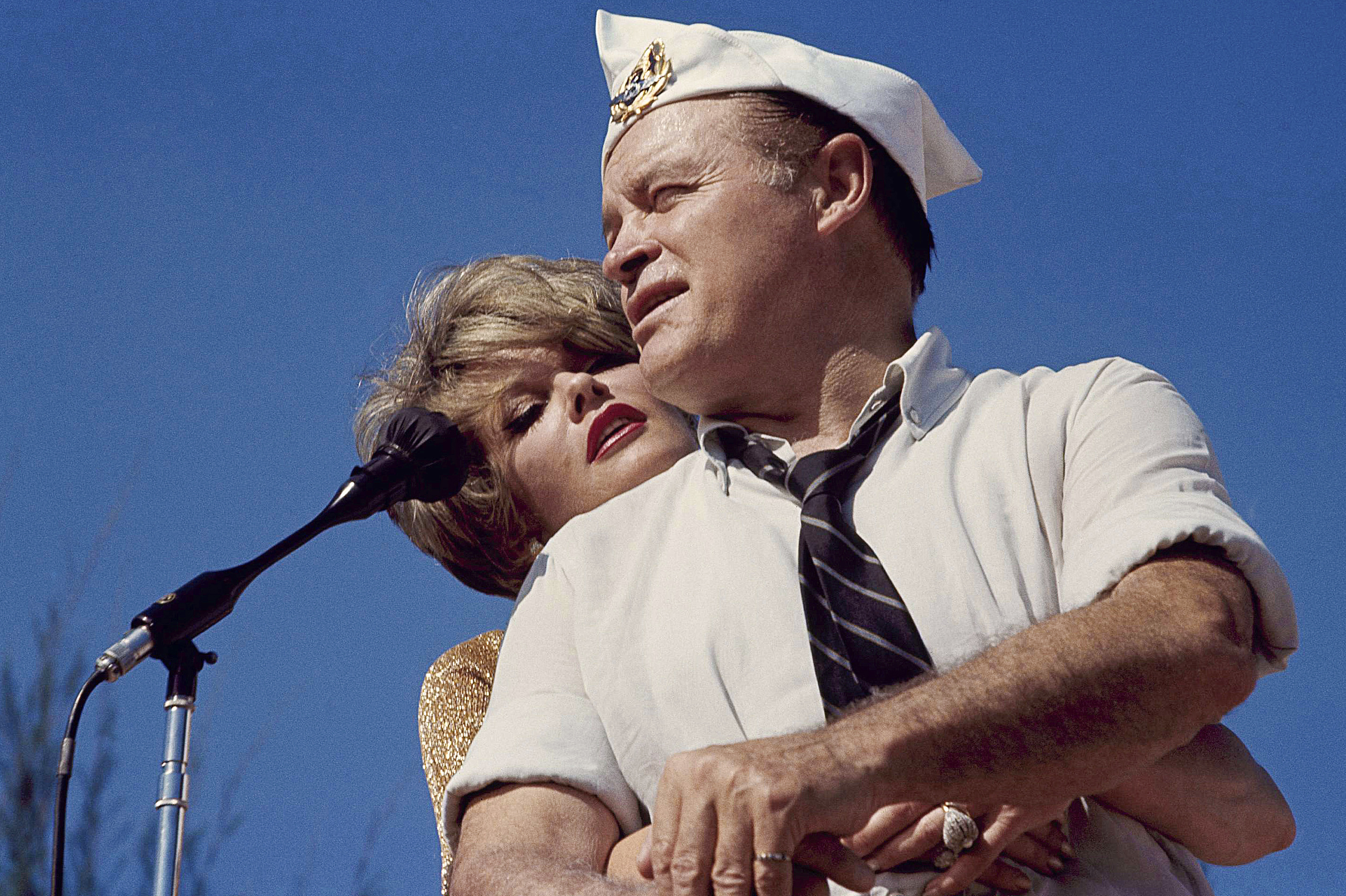 Bob Hope and Janis Paige hug in 1964.