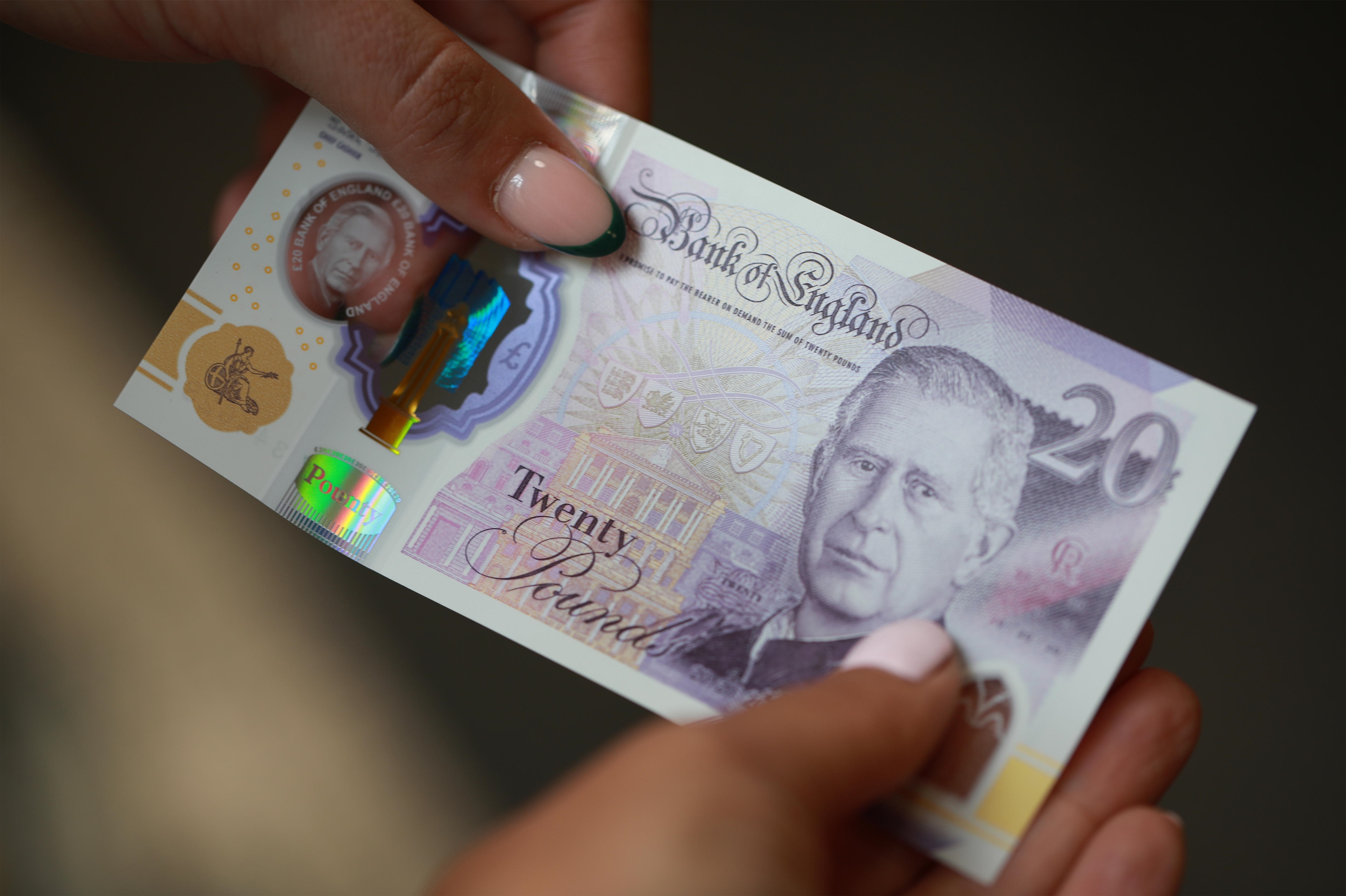 20 pound banknote featuring the portrait of King Charles III.