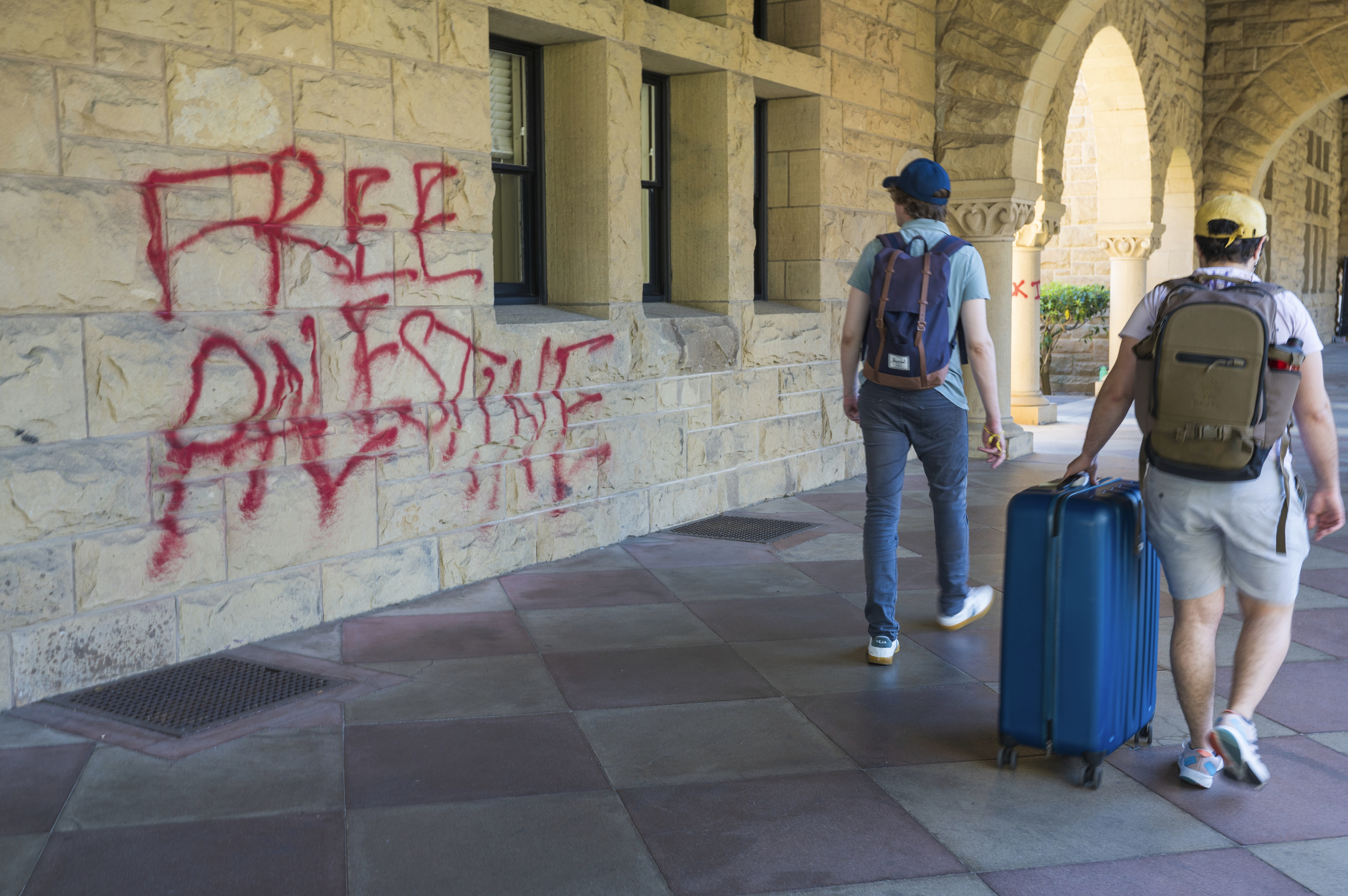 Graffiti is painted on the wall near the office of the President at Stanford University.