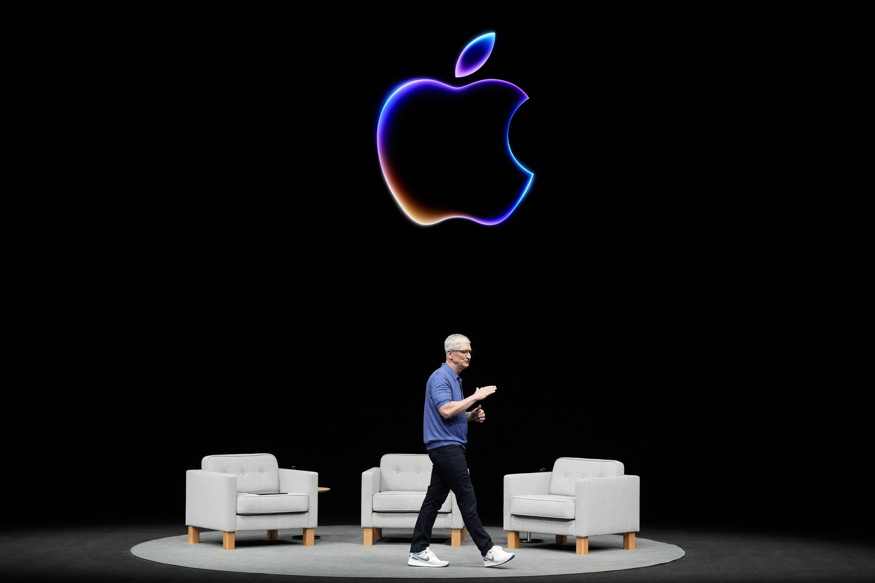 Apple CEO Tim Cook speaks during an Apple event.