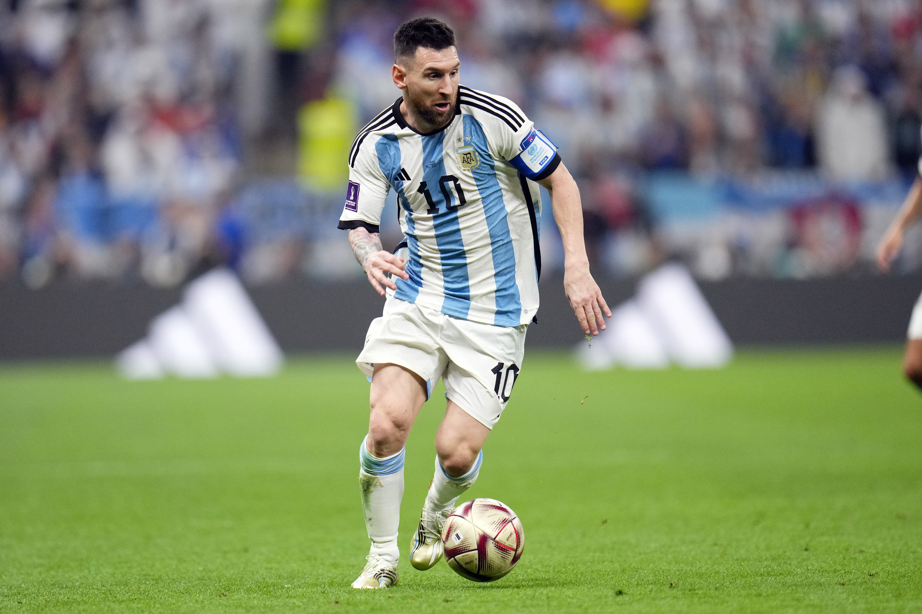 Argentina's Lionel Messi goes for the ball.