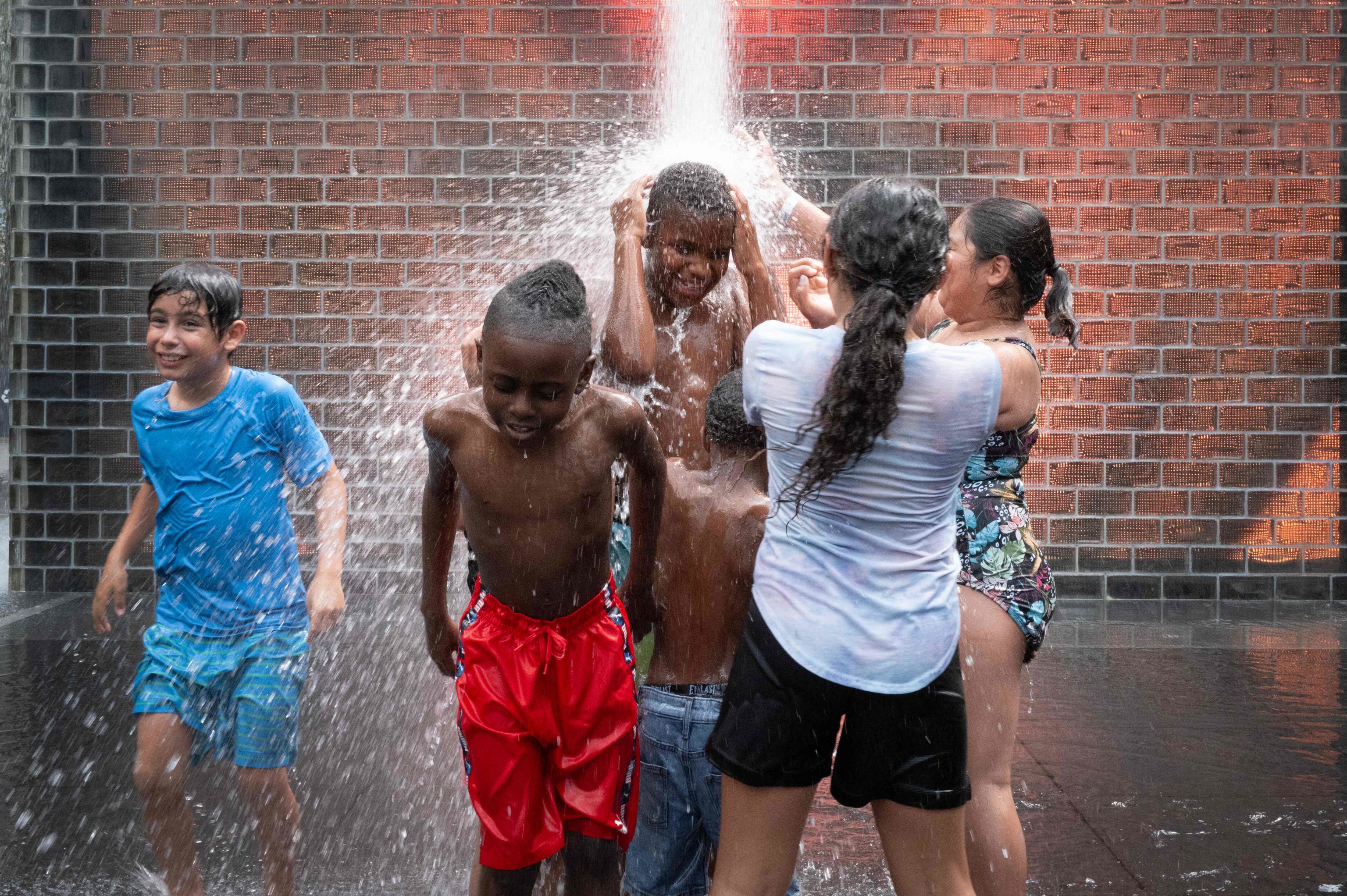 People cool off at Crown Fountain in Chicago.