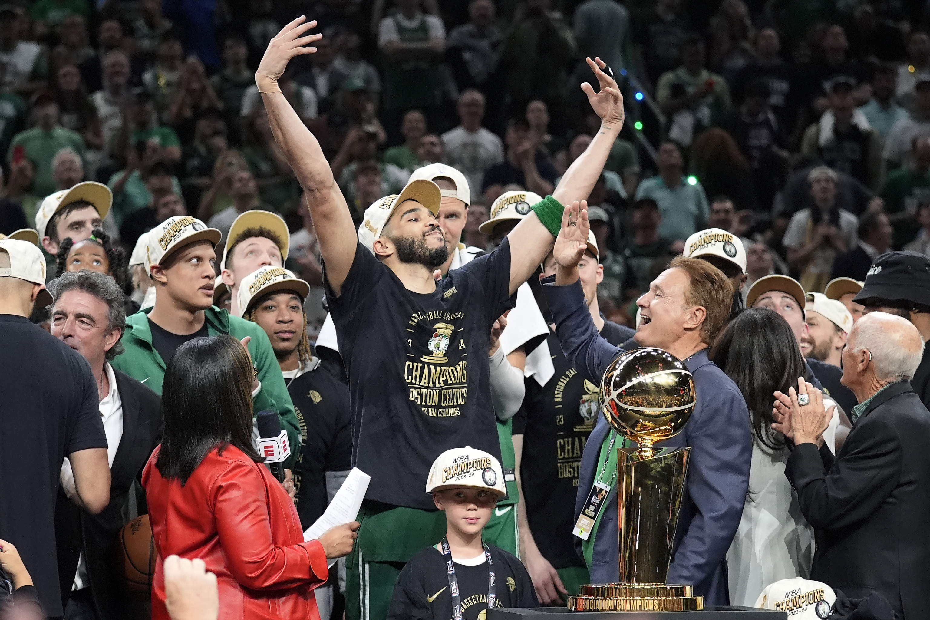 Boston Celtics forward Tatum, celebrates Championship.