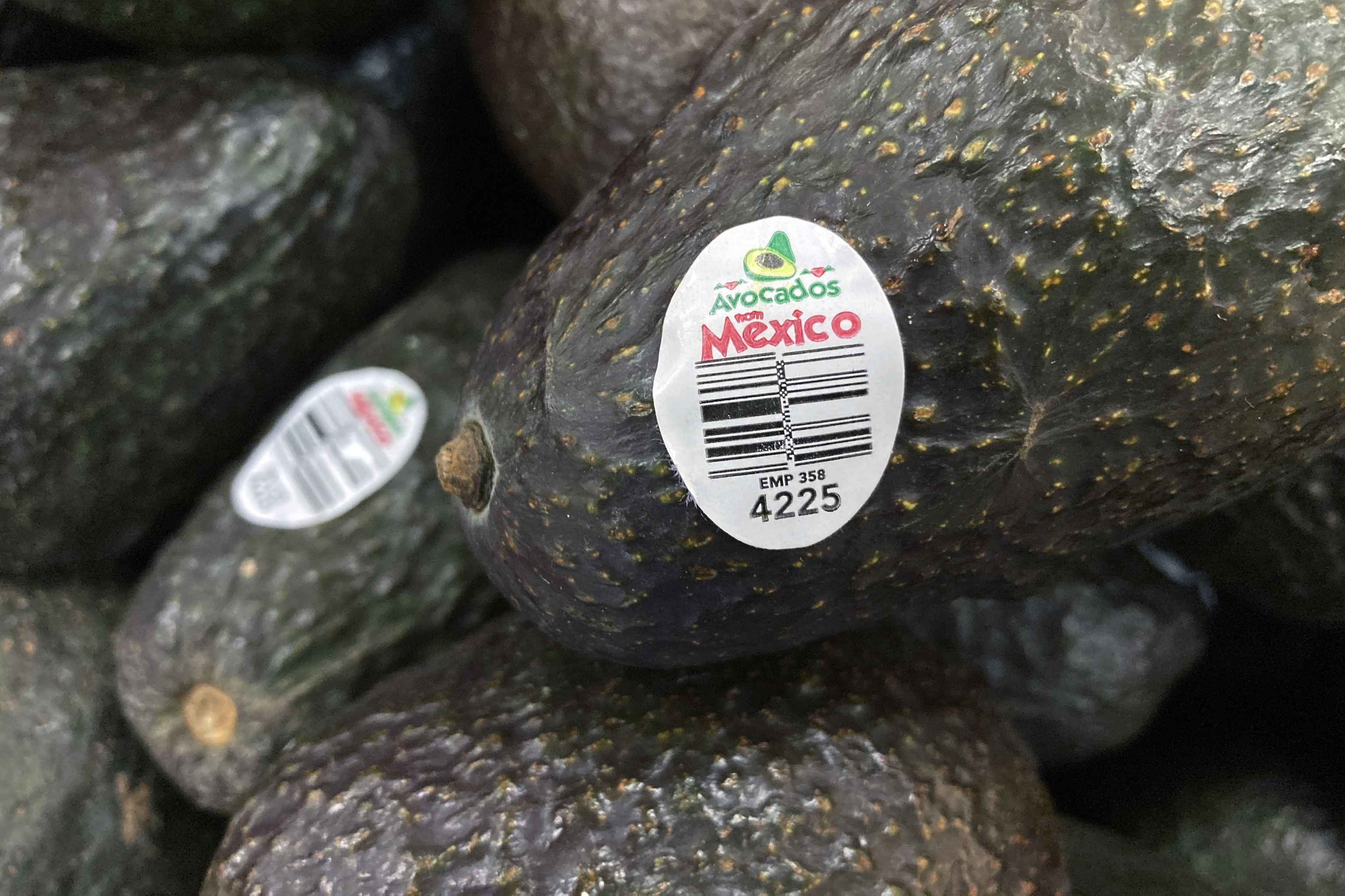 Avocados from Mexico are for sale at a grocery store.