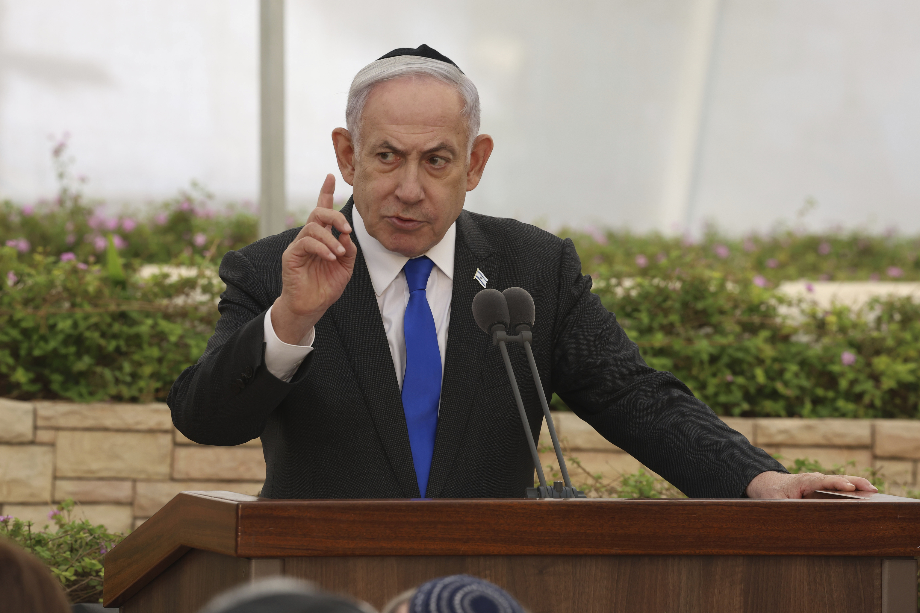 Israeli Prime Minister Benjamin Netanyahu speaks during a ceremony.