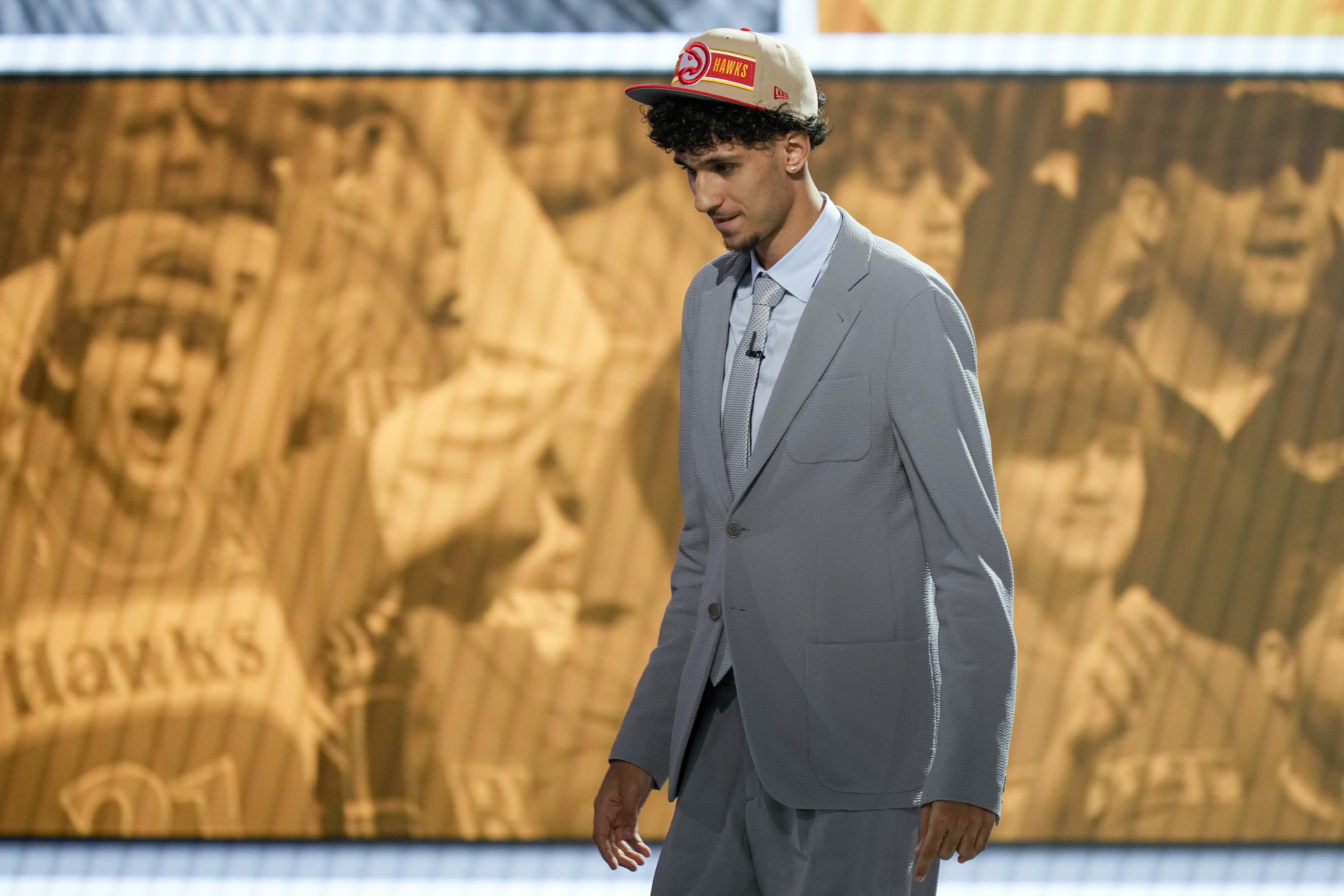 Zaccharie Risacher reacts during an interview after being selected by the Atlanta Hawks as the first pick.