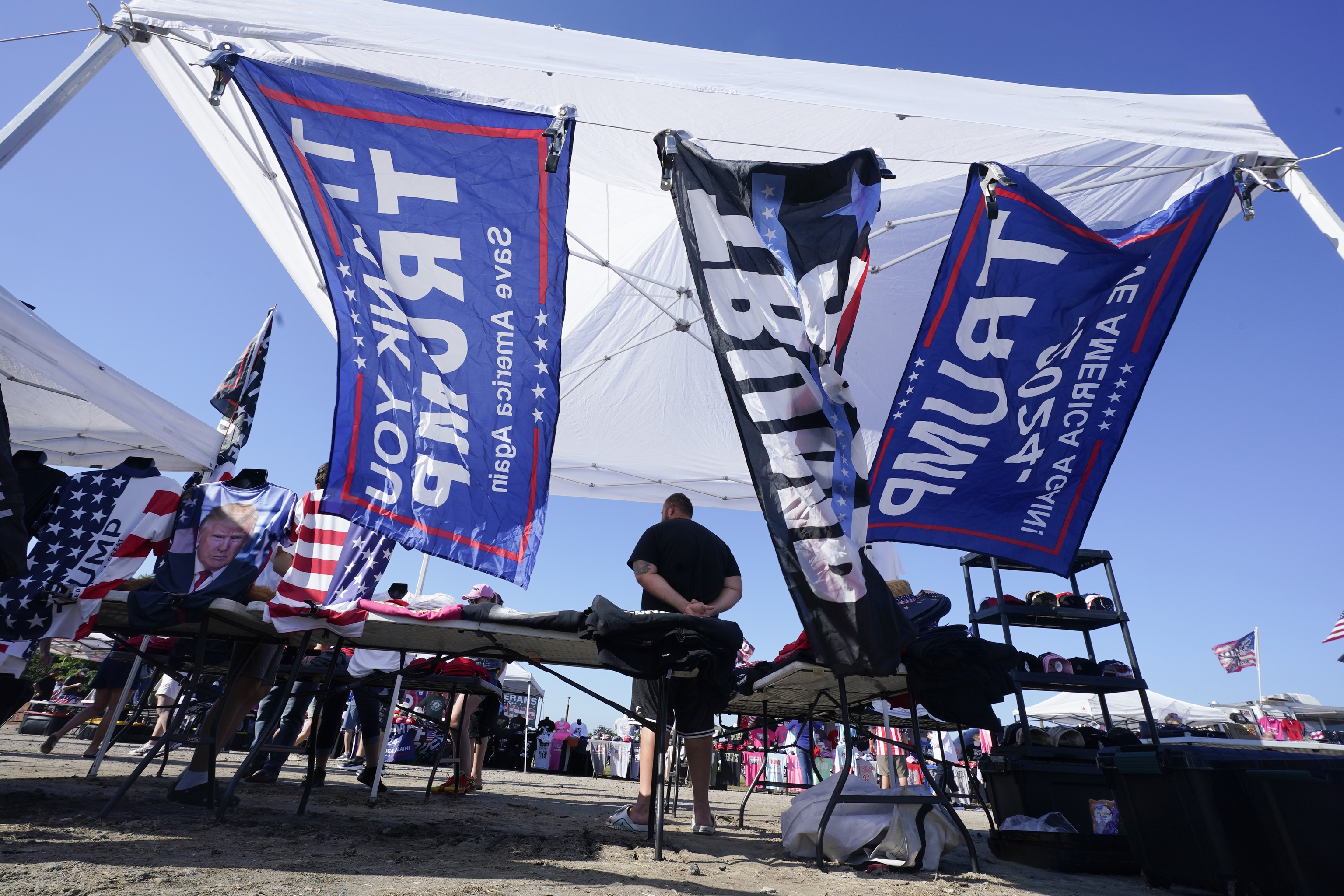 Vendors are setup ahead of a campaign rally for Trump.