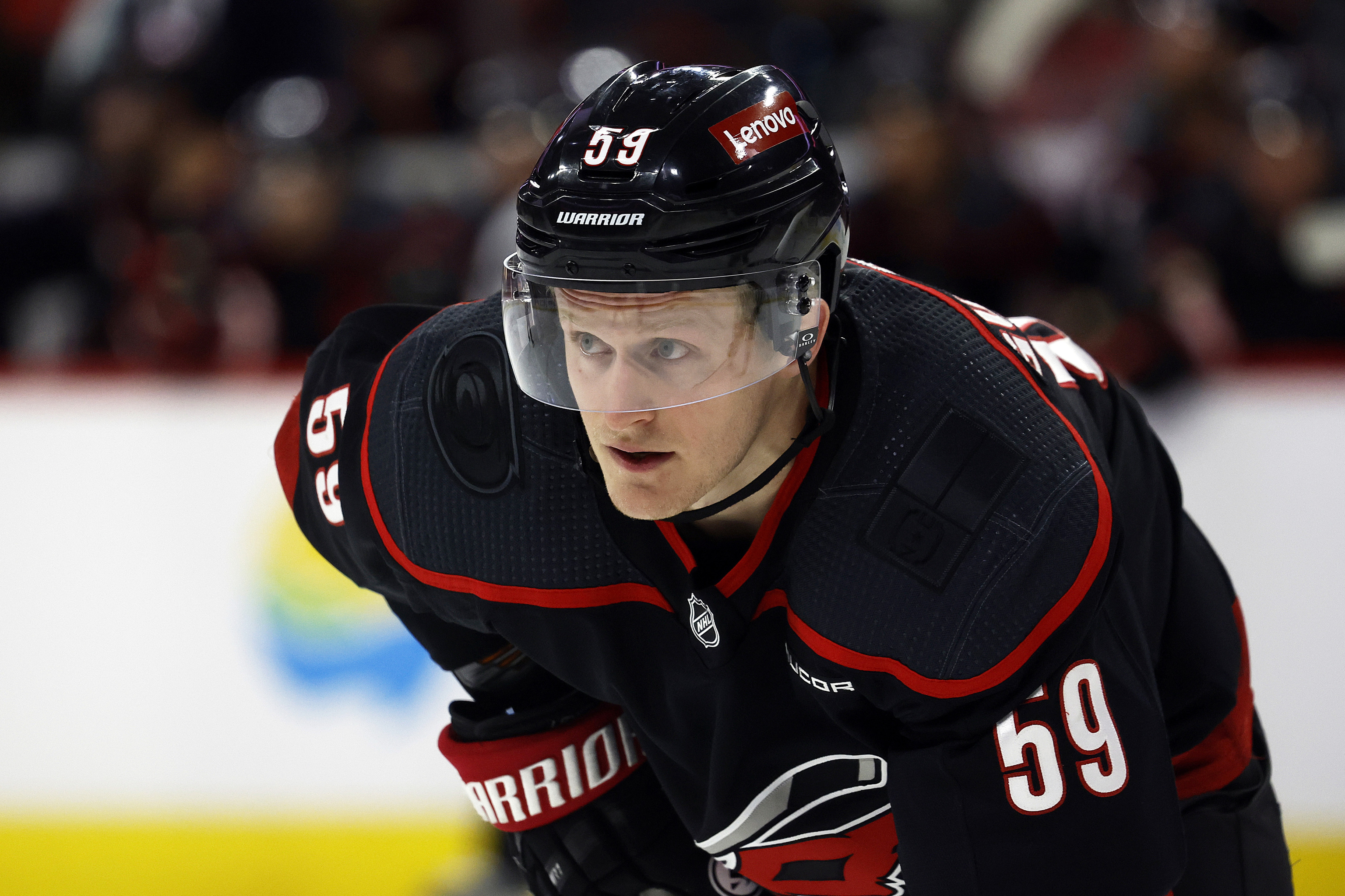 Carolina Hurricanes' Jake Guentzel (59) watches the puck during the second period of an NHL hockey game.