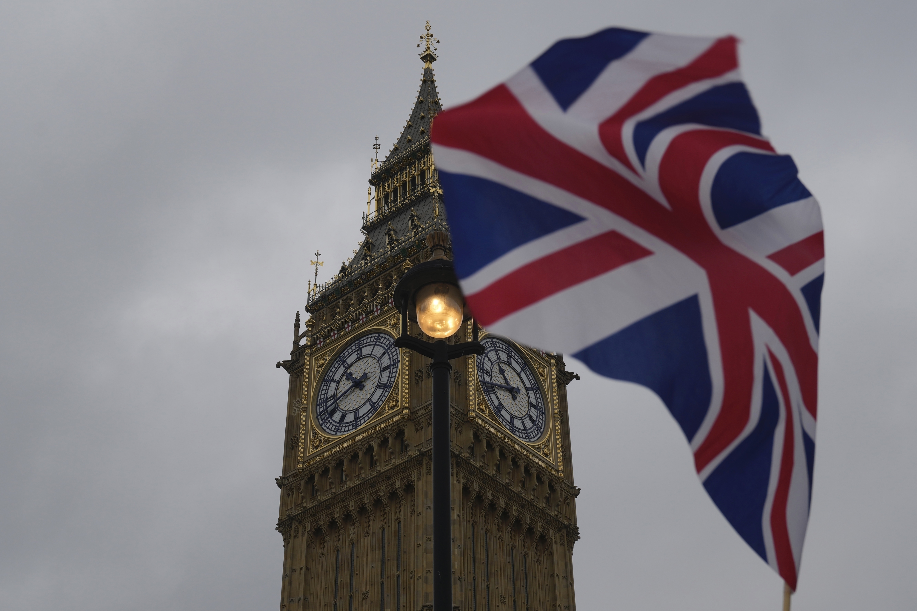 A Union flag outside the Houses of Parliament, in London.
