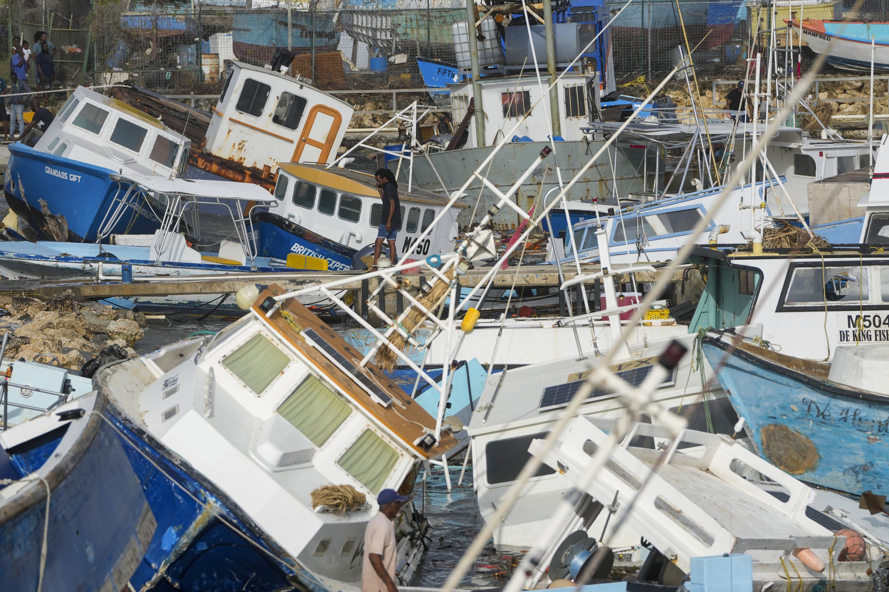 Fishing boats, damaged after Hurricane Beryl hit Barbados.