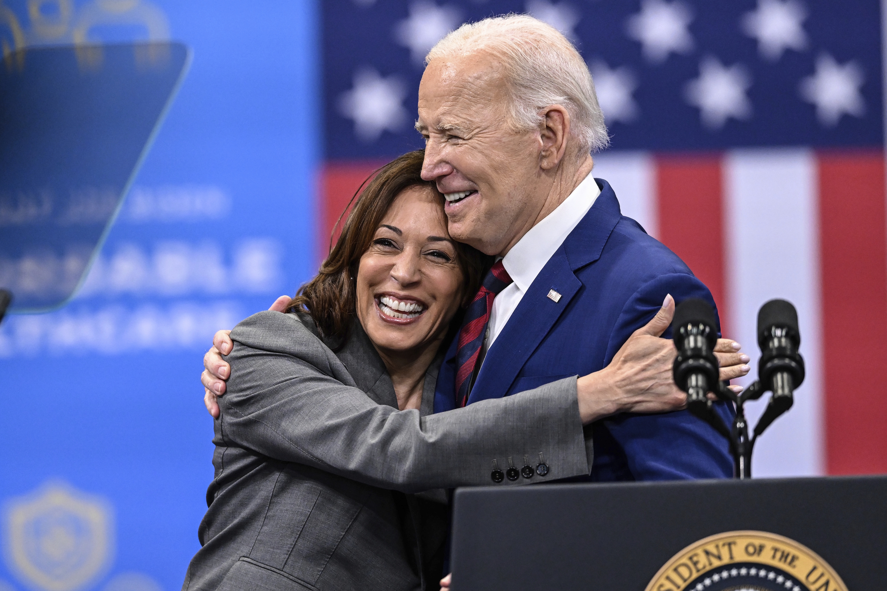 Vice President Kamala Harris embraces President Biden.