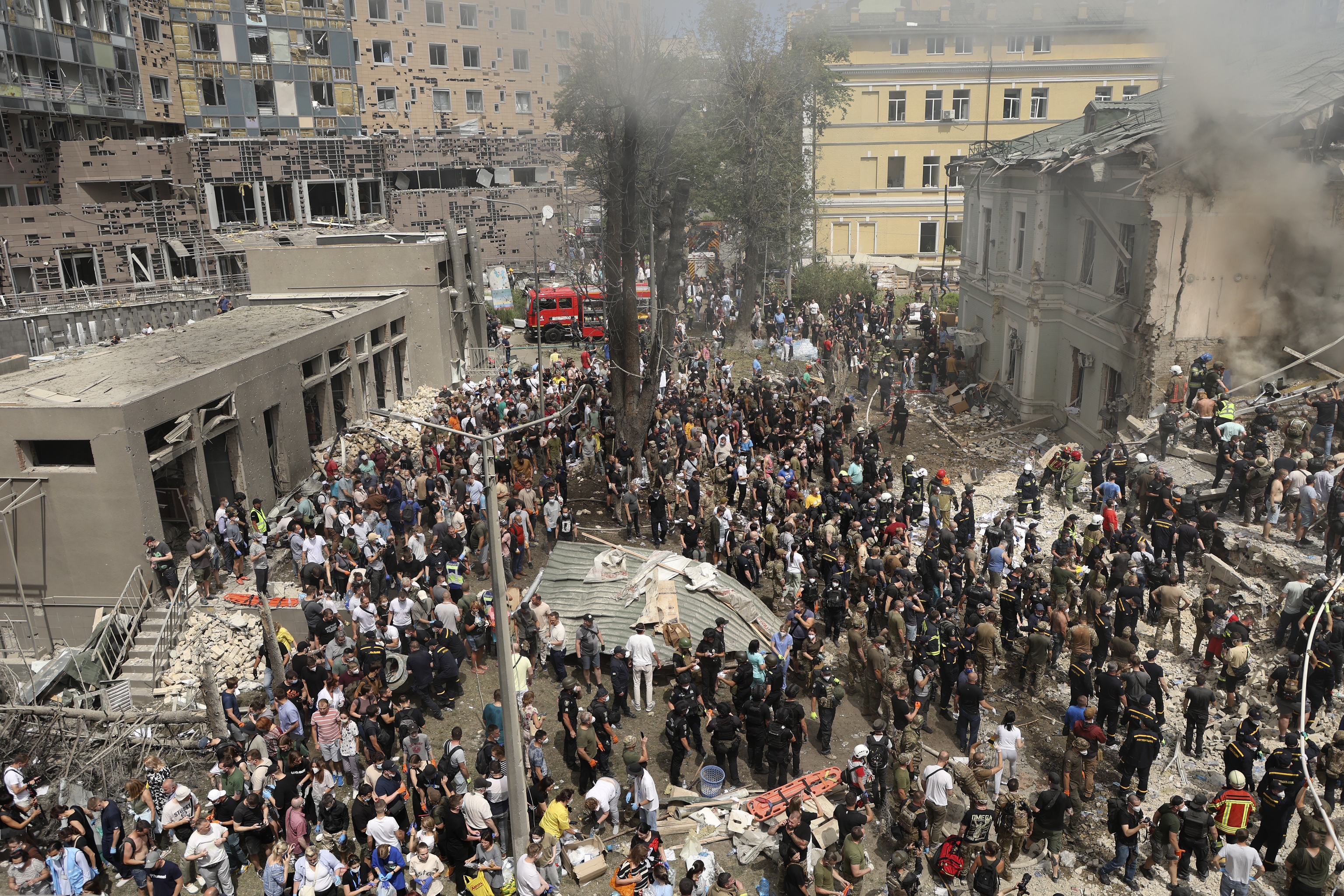 Rescuers search for victims in the children hospital in Kyiv.