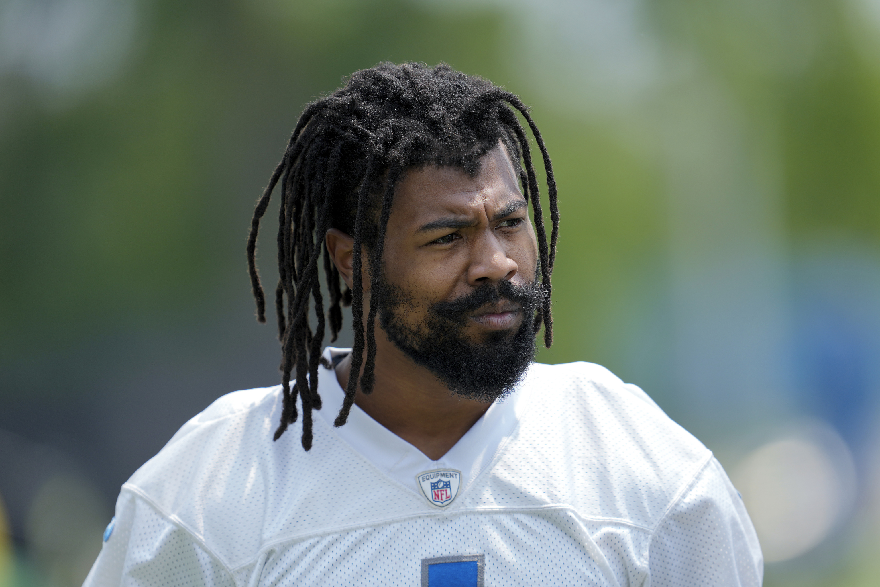 Detroit Lions cornerback Cam Sutton looks on after an NFL football practice.