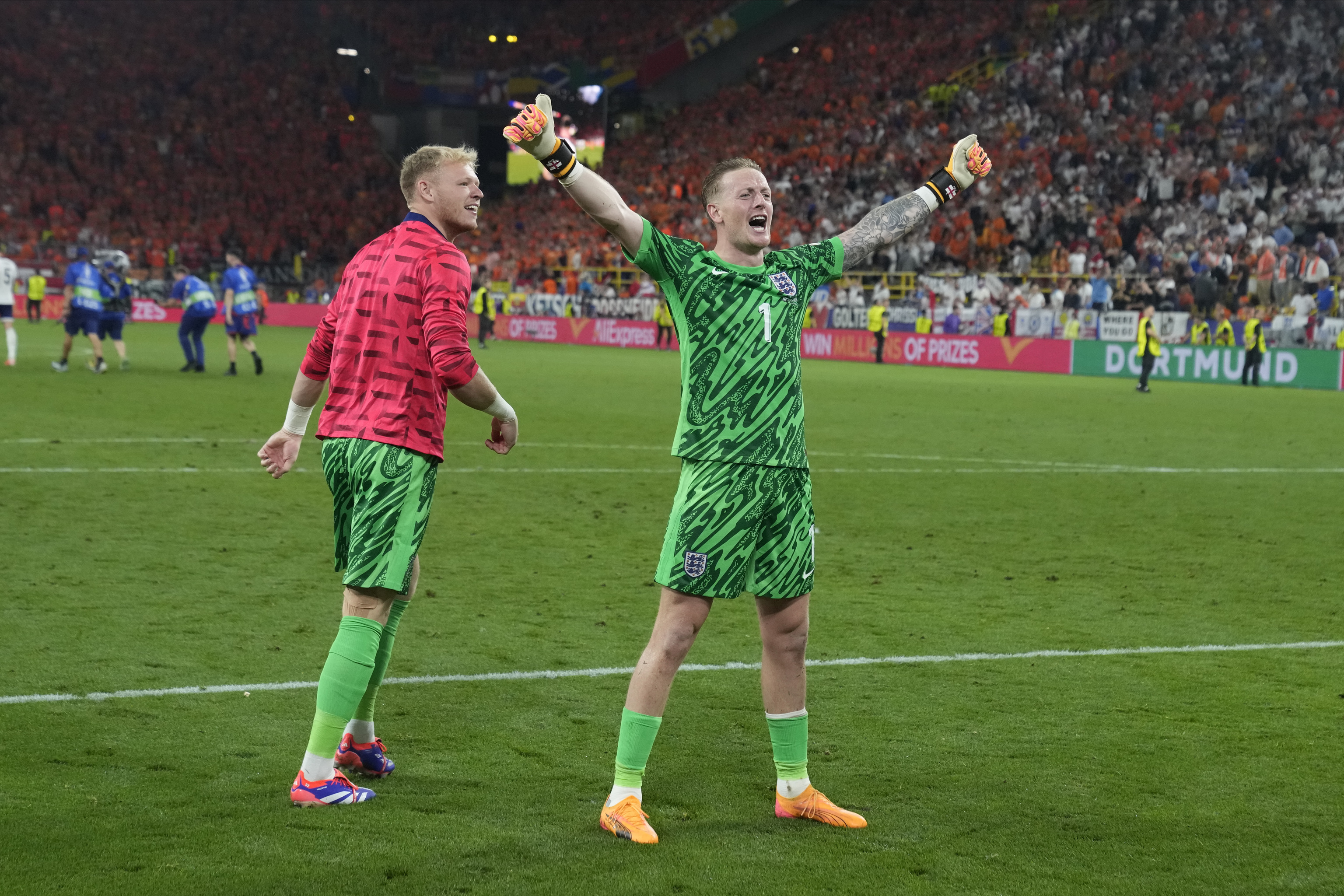 England's goalkeeper Jordan Pickford celebrates at the end of a semifinal against Netherlands at the Euro 2024 soccer tournament.