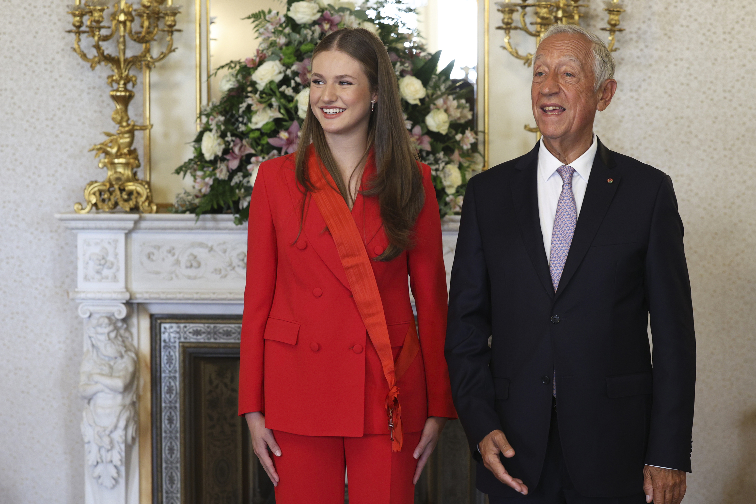 Spanish Crown Princess Leonor smiles after being decorated with the Grand Cross of the Order of Christ by Portuguese President Marcelo Rebelo de Sousa.