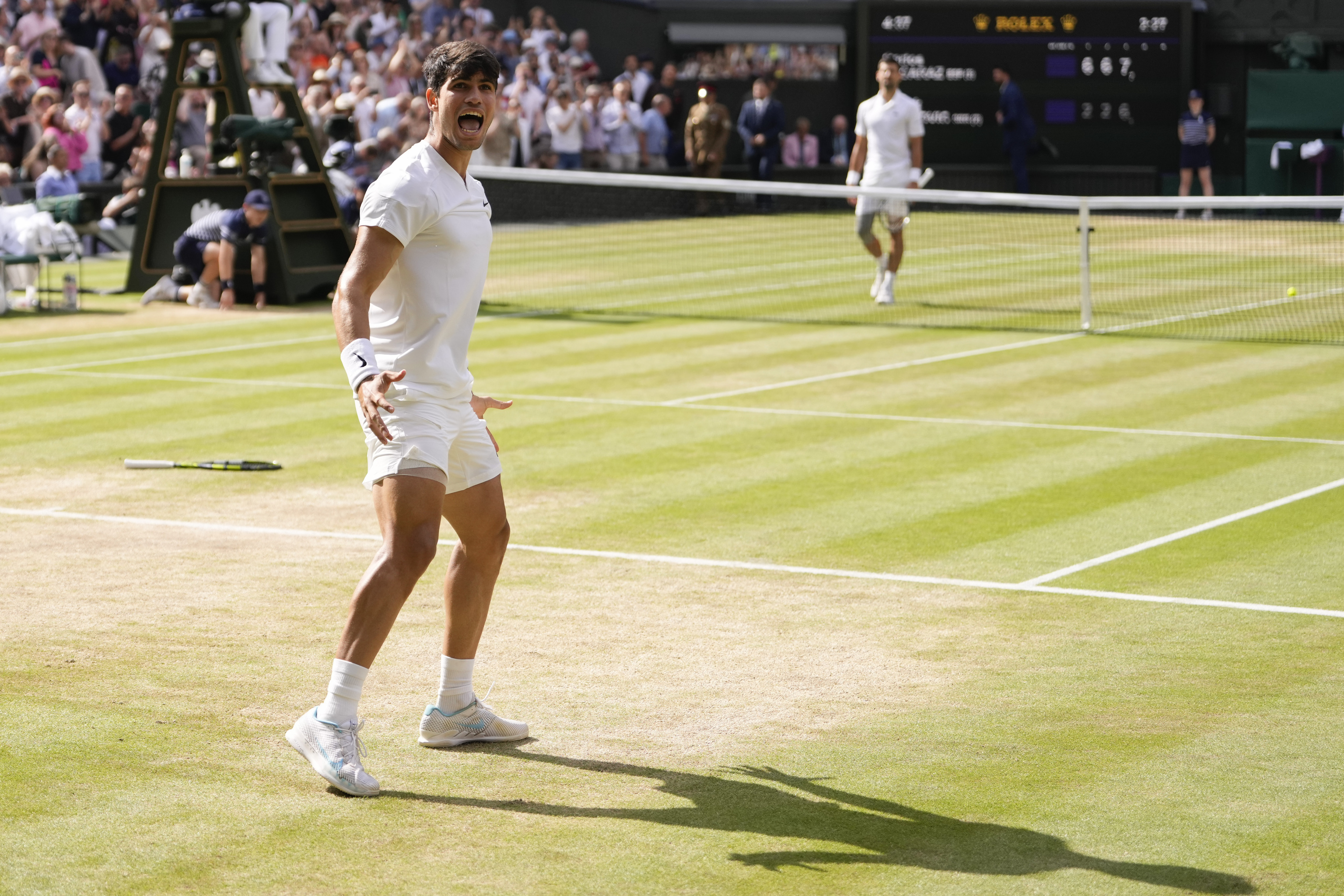 Carlos Alcaraz of Spain celebrates after defeating Novak Djokovic of Serbia in the men's singles final at the Wimbledon tennis championships in London.