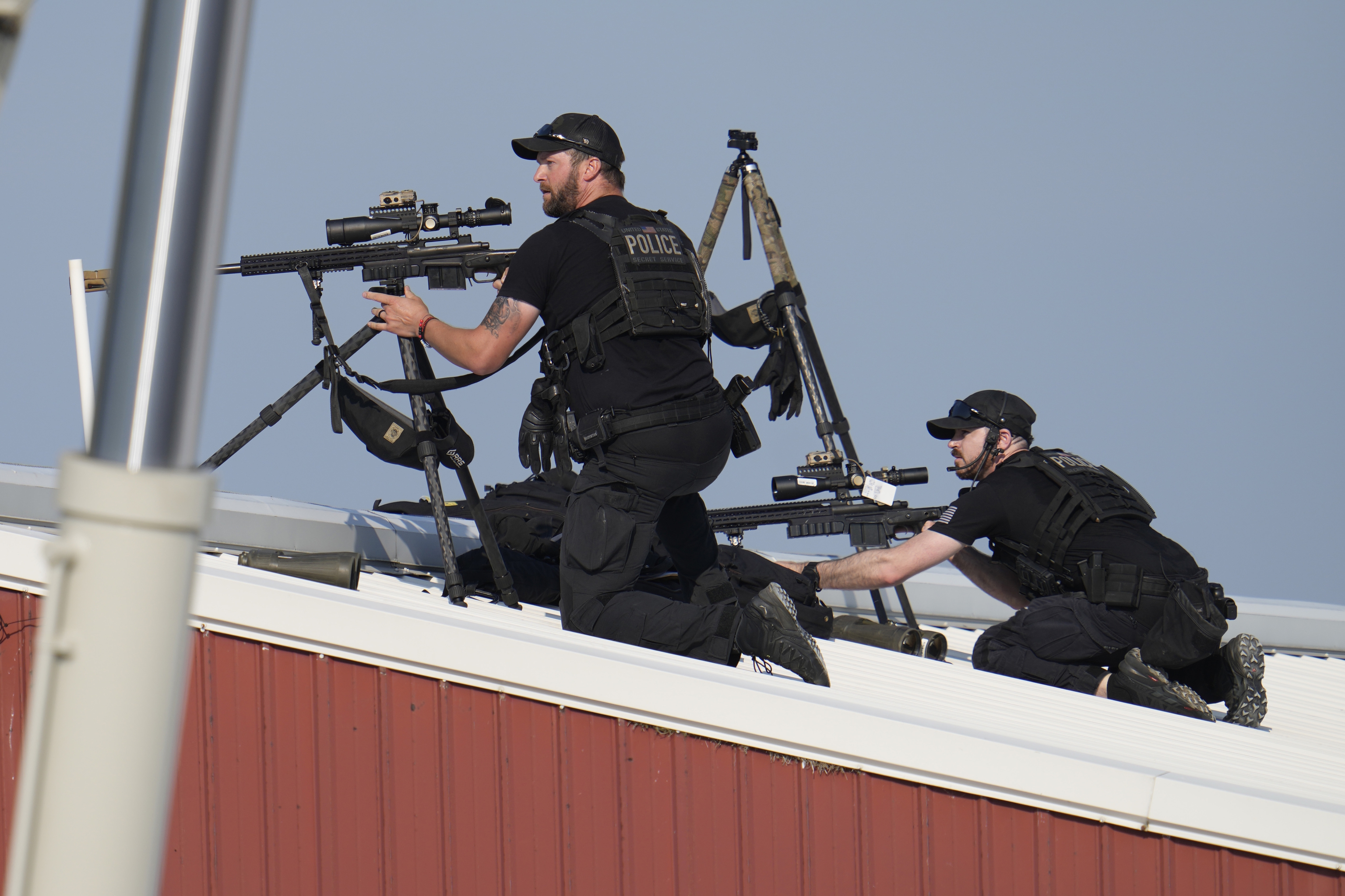 Police snipers return fire after shots were fired during a rally for Trump.