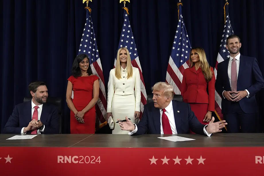 Vance with Donald Trump and part of their family.