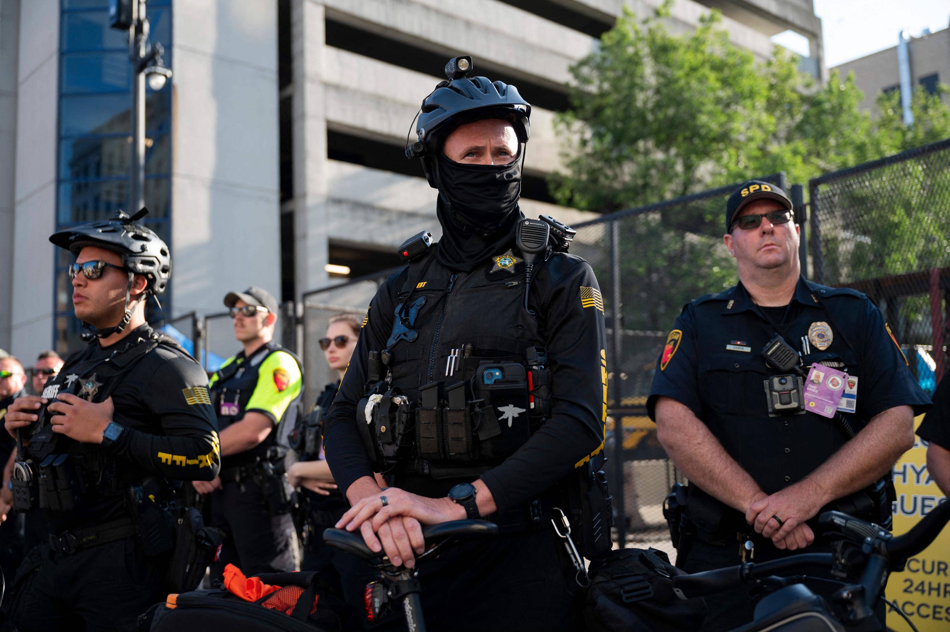 Law enforcement officers stand guard in Milwaukee.