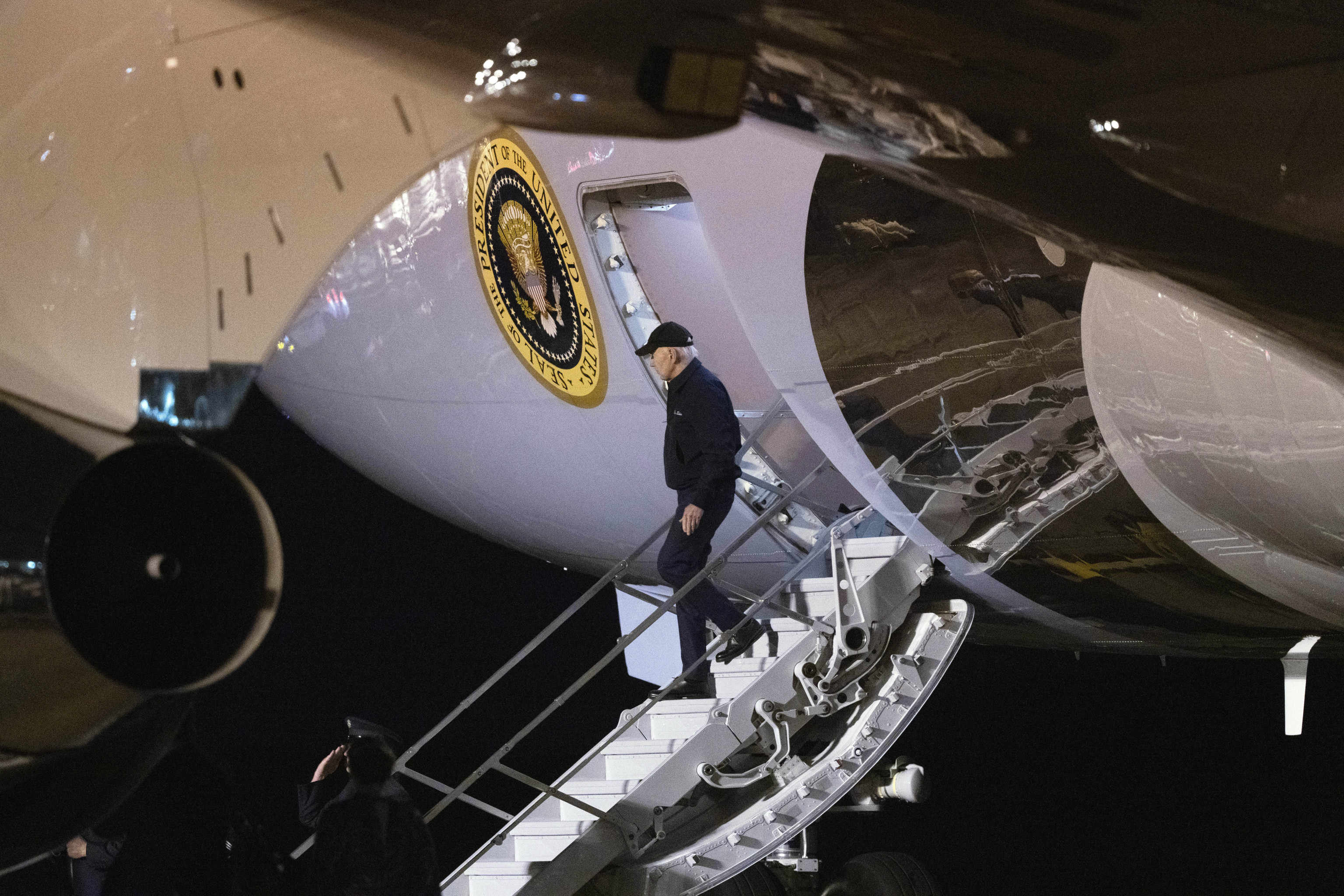 President Joe Biden disembarks Air Force One as he arrives at Dover Air Force Base.