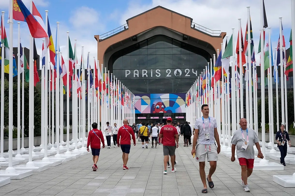 Athletes in front of the canteen at the Olympic Village in Paris.