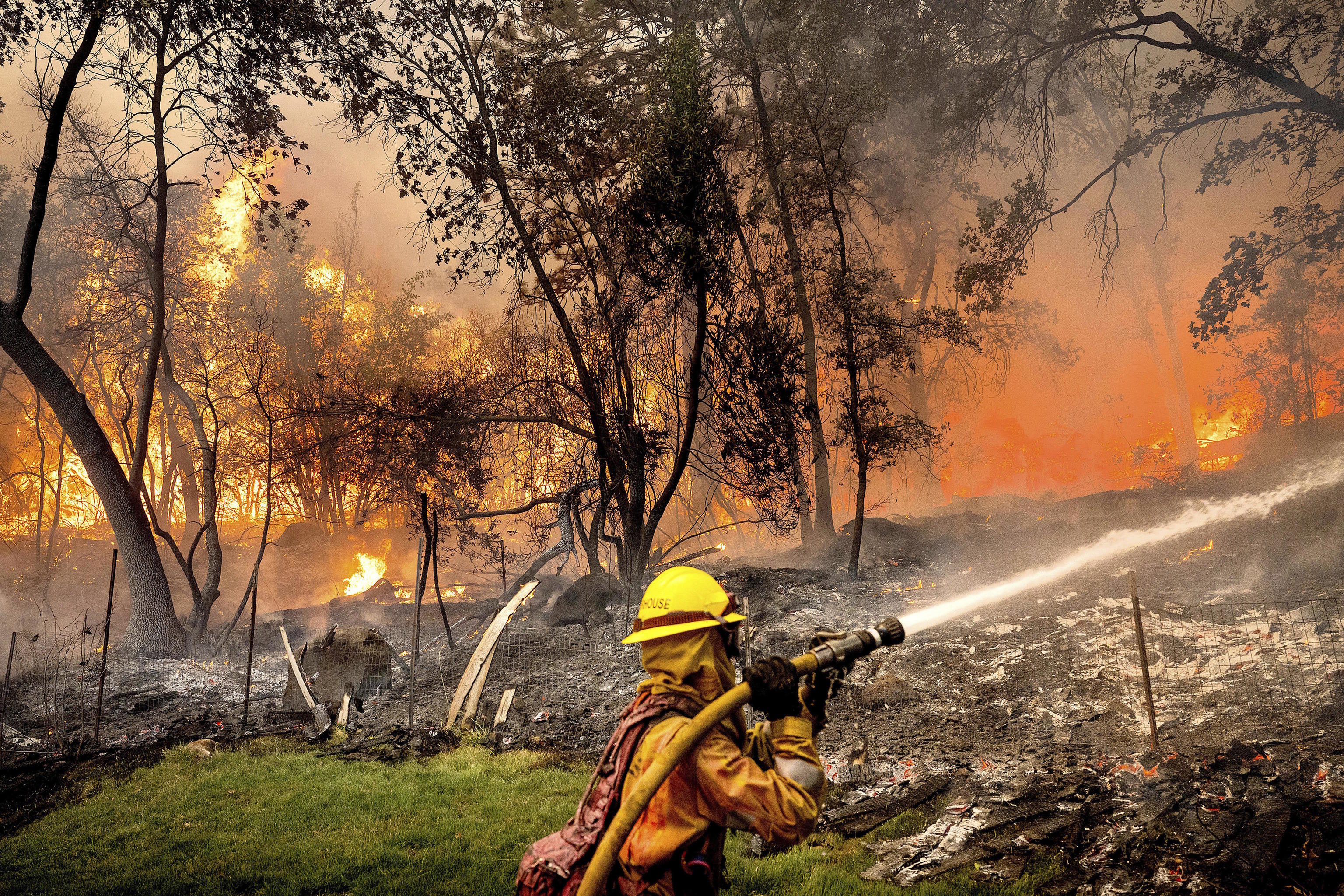 Firefighter Christian Moorhouse battles the Park Fire.