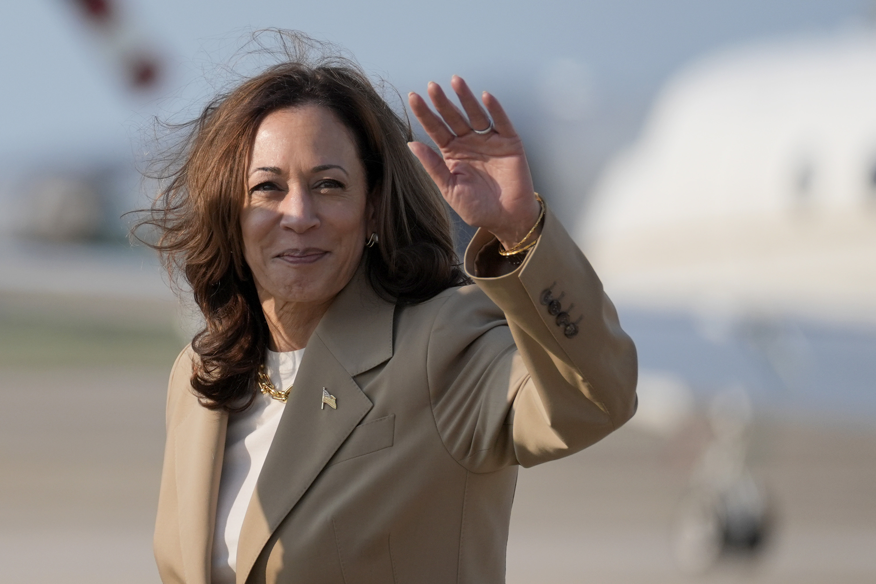 Vice President Kamala Harris waves.