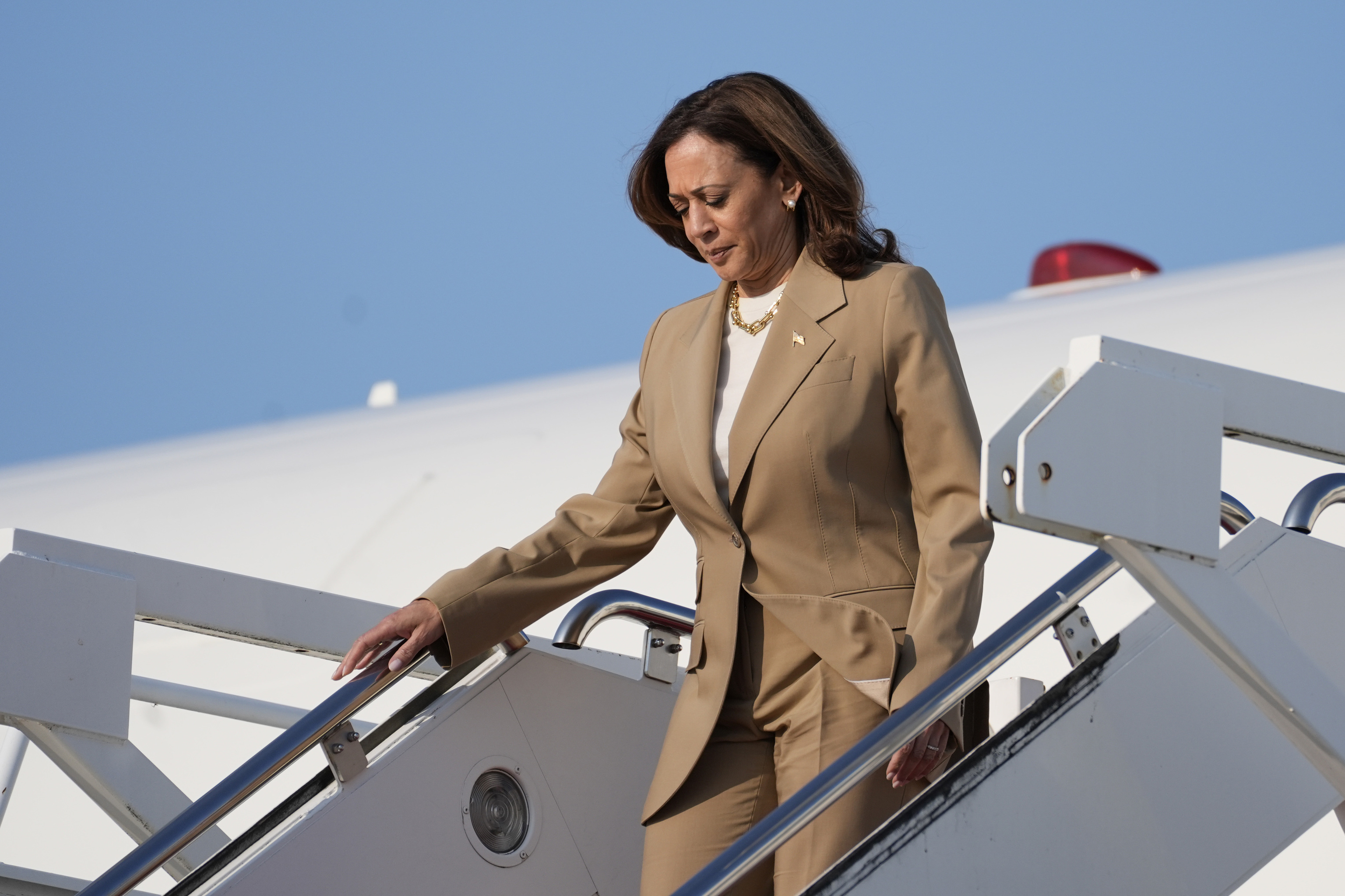 ice President Kamala Harris steps off of Air Force Two.